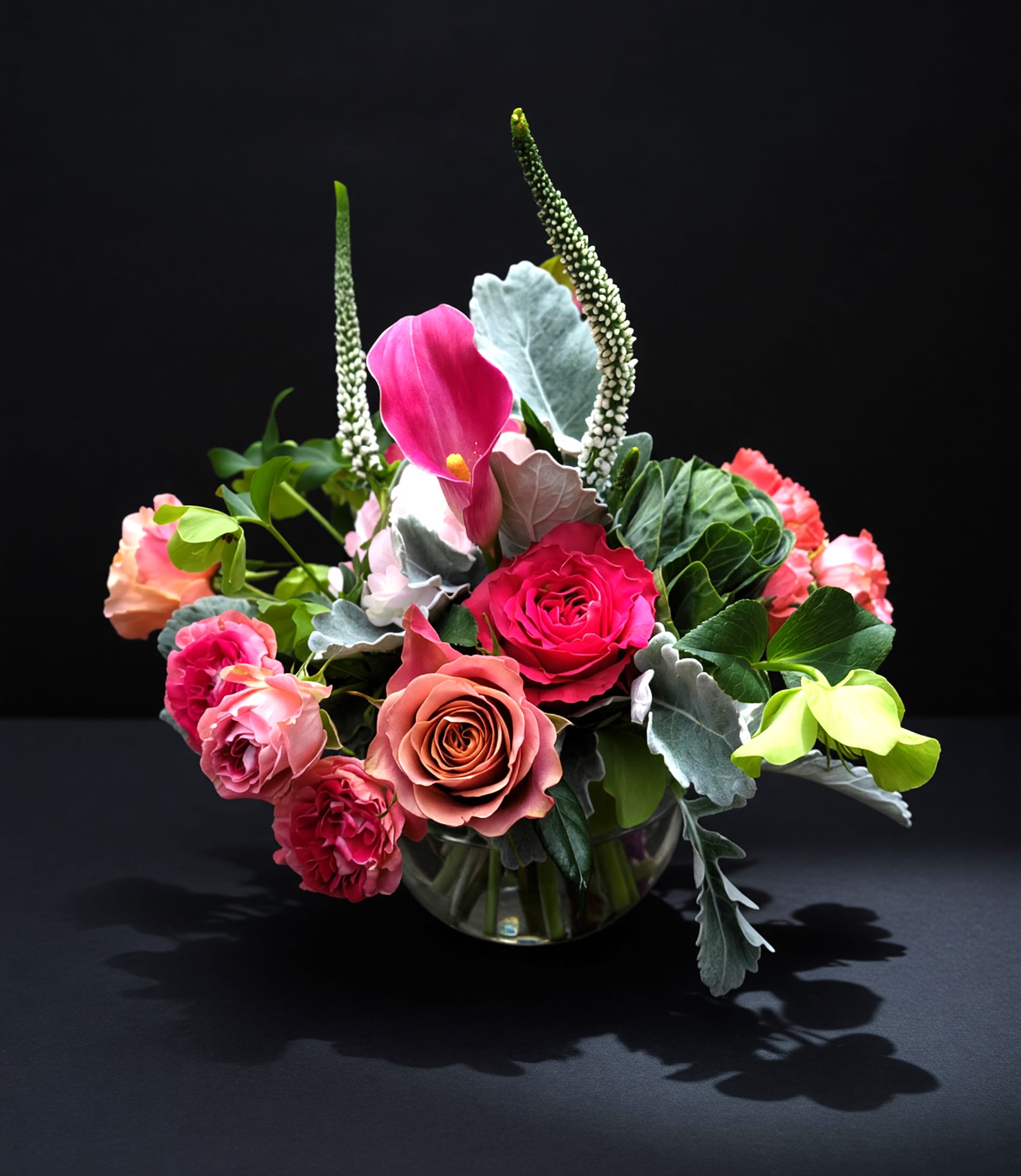 Flora - Soft expression in pinks, light greens and blushes. Premium mixture of imported product for South America. Hydrangea, garden &amp; spray roses, hellebore, veronica, calla lilies, kale and assorted foliage. Designed in a clear glass bubble.