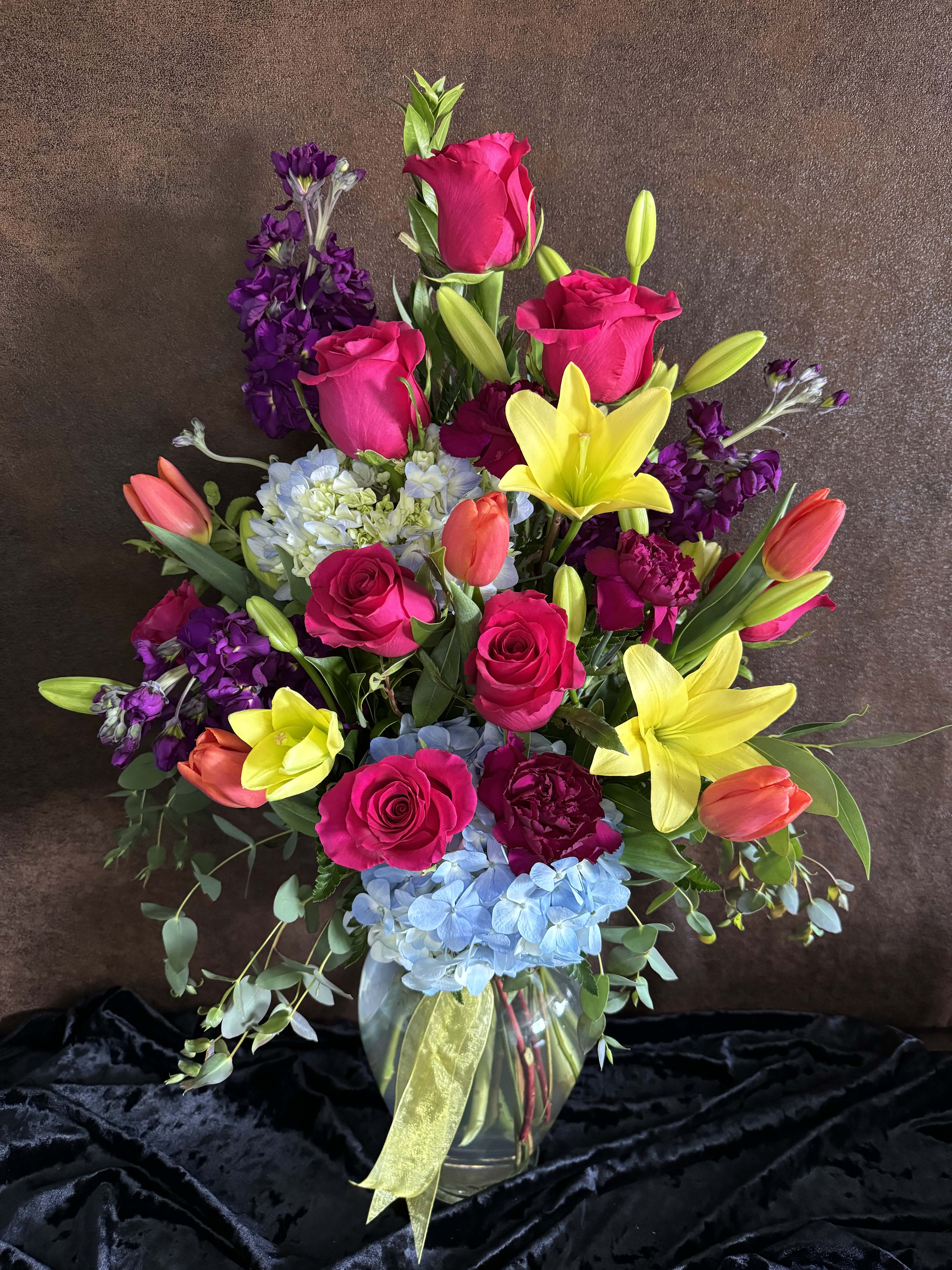 Serendipity  - This arrangement is sure to knock anyone’s socks off! It is a big beautiful stunner!