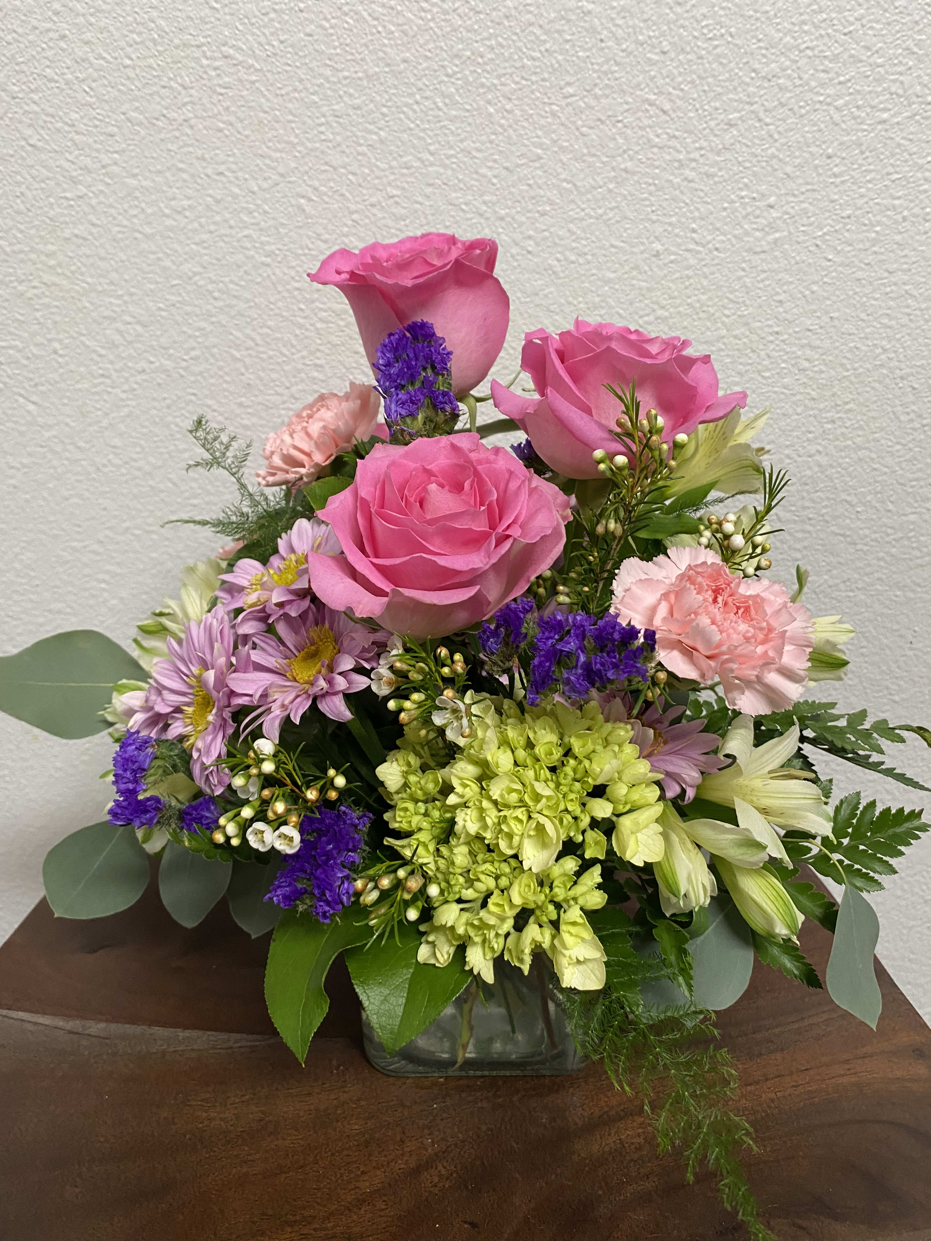 Spring Wishes - Pink roses and carnations with green hydrangea make for a sweet combination.