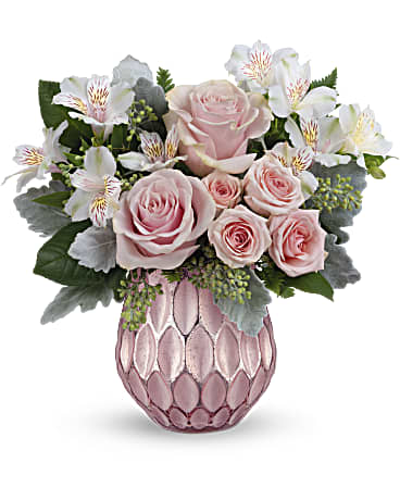 Pink roses and white alstroemeria in a pink textured vase