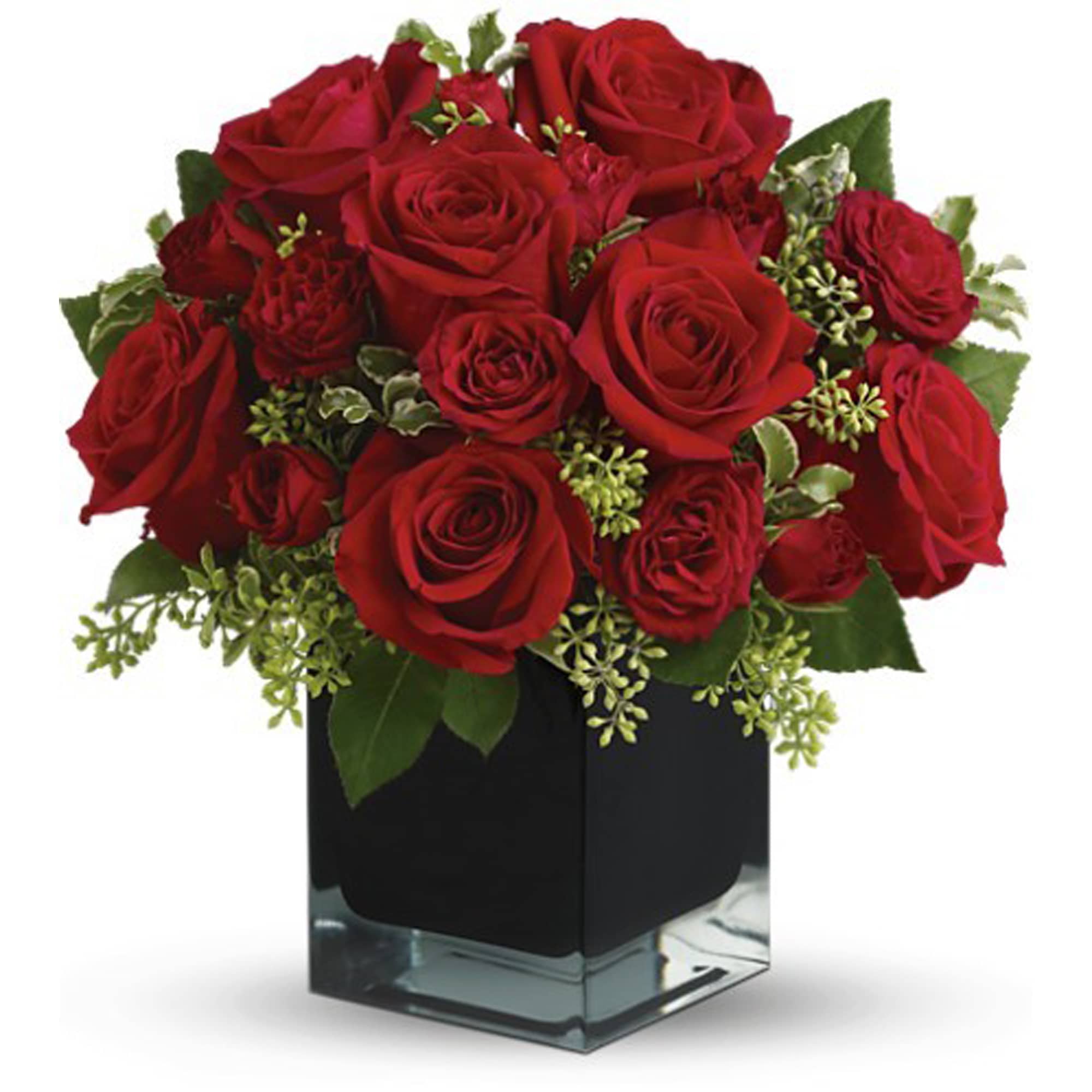 Red roses arranged in a square glass vase