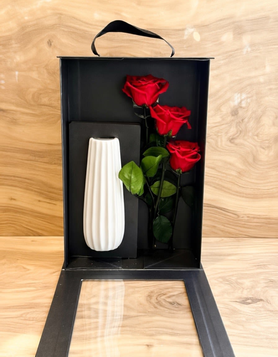 Forever Roses  - Preserved roses are 100% real, natural Roses (Available in Pink color) that undergo a specialized, non-toxic preservation process to maintain their soft, fresh appearance for 1 to 3+ years without water or sunlight. The gift box comes with a ceramic vase. Size H14" X W10" 