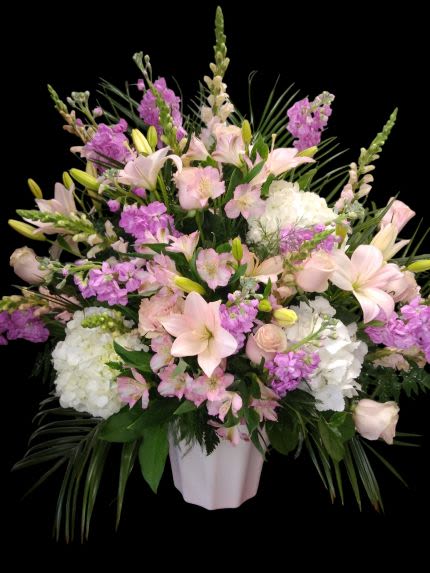 Serene Departure - Different shades of pinks with white hydrangeas.