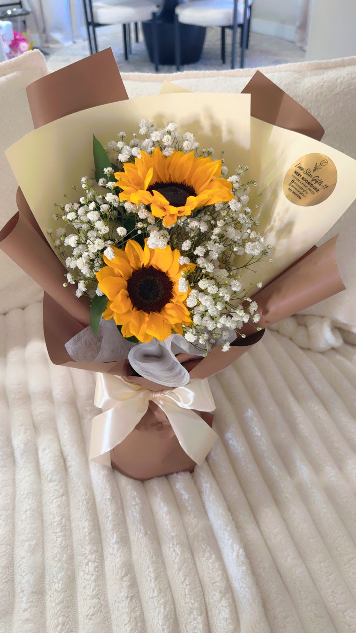 A Little Sunshine for You - Send a little sunshine just because  This cheerful bouquet features fresh sunflowers, delicate baby’s breath, and soft greenery, wrapped in our signature elegant style.  Perfect for brightening someone’s day, saying “I’m thinking of you,” or simply making someone smile for no reason at all.   Same-day delivery available in Midland, Odessa 