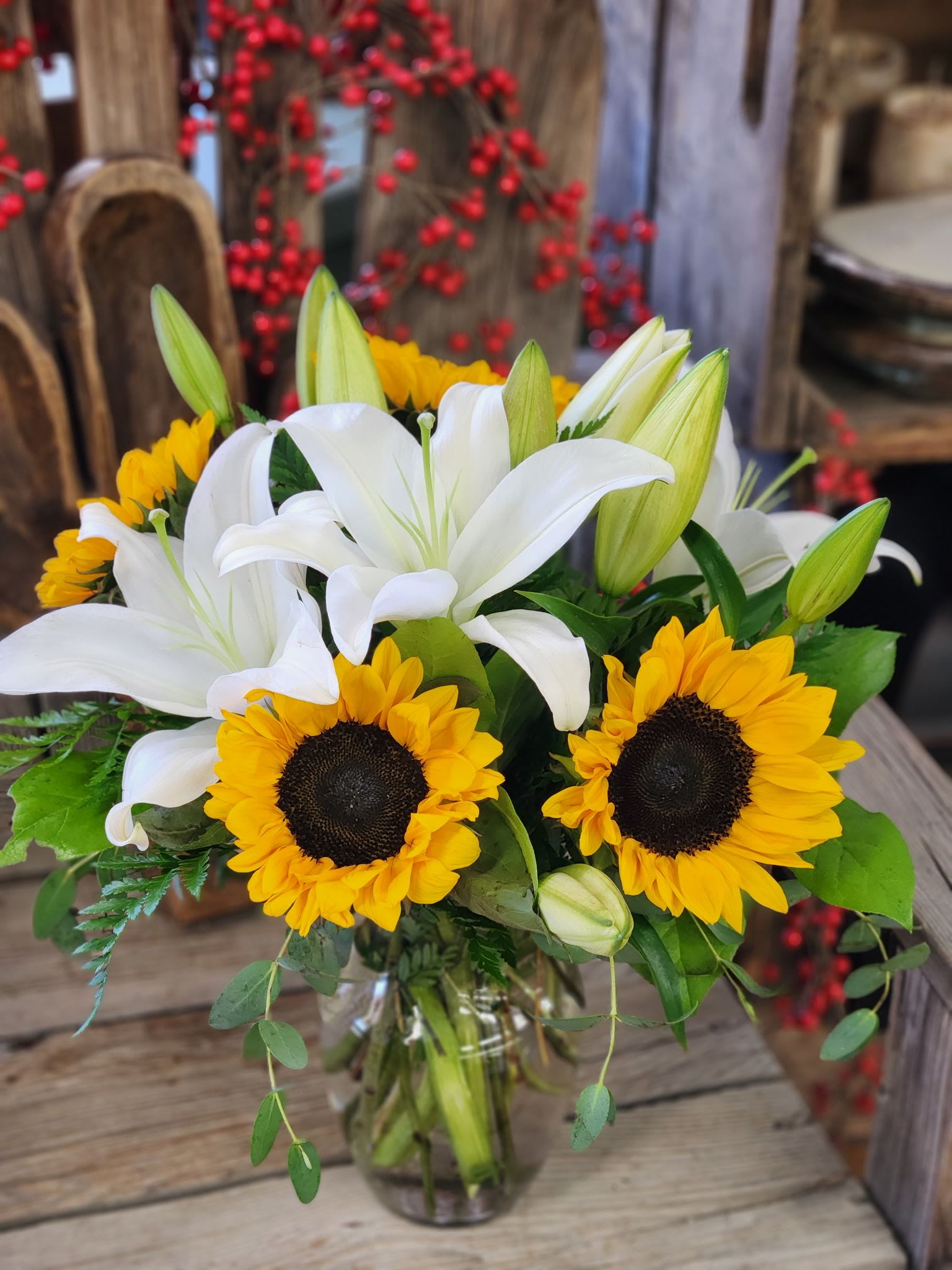 Suns and Stars - Bright sunshiney sunflowers and fragrant stargazers make a beautiful statement! Choose between white or hot pink stargazers and let us know in the special instructions. 