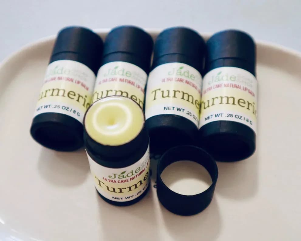 Natural Shea Butter Lip Balm - Turmeric - Natural Shea Butter Lip Balm - Turmeric Enjoy the best lip treat and moisturizer for your lips! 0.25oz/8g Packed in the eco-friendly cardboard tubes ** This lip balm is naturally colored with the olive oil infusion of organic turmeric powder. Ingredients: Shea Butter, Bees wax, Olive Oil (Turmeric infused), Sweet Almond Oil. Marshmallow Food Flavor Oil.