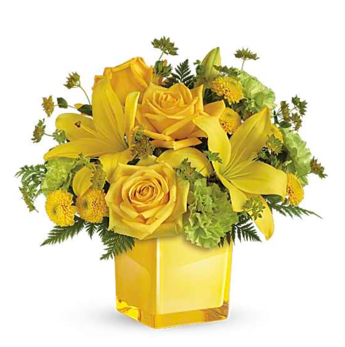 TF Sunny Mood Bouquet - This bright bouquet includes yellow roses, yellow Asiatic lilies, green carnations, yellow button spray chrysanthemums, bupleurum and leatherleaf fern.