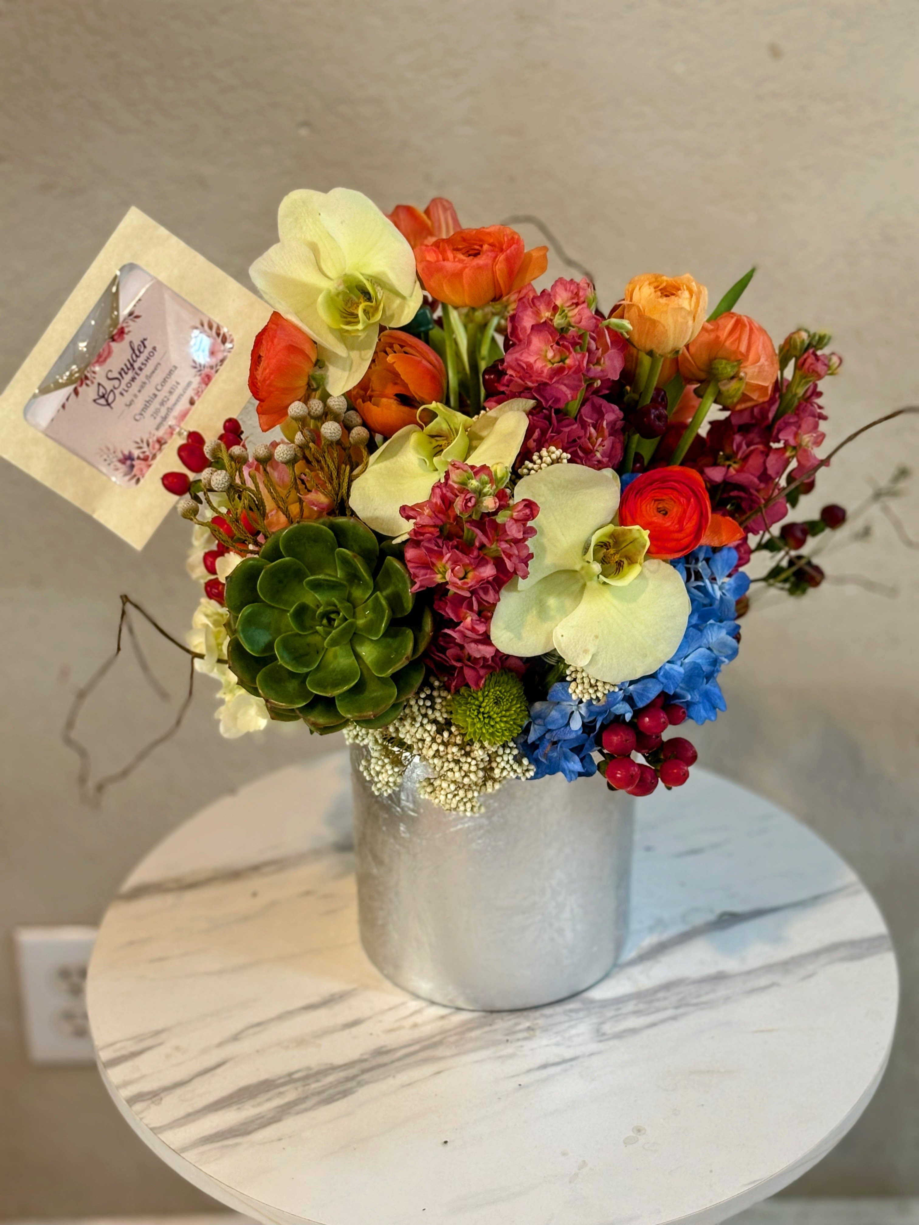 Succulent &amp; Orchid Flower Design - Modern orchid and succulent flower arrangement with hydrangeas and ranunculus designed by Snyder Flower Shop. Premium same day flower delivery in San Antonio for elegant gifts, luxury floral decor and special occasions.