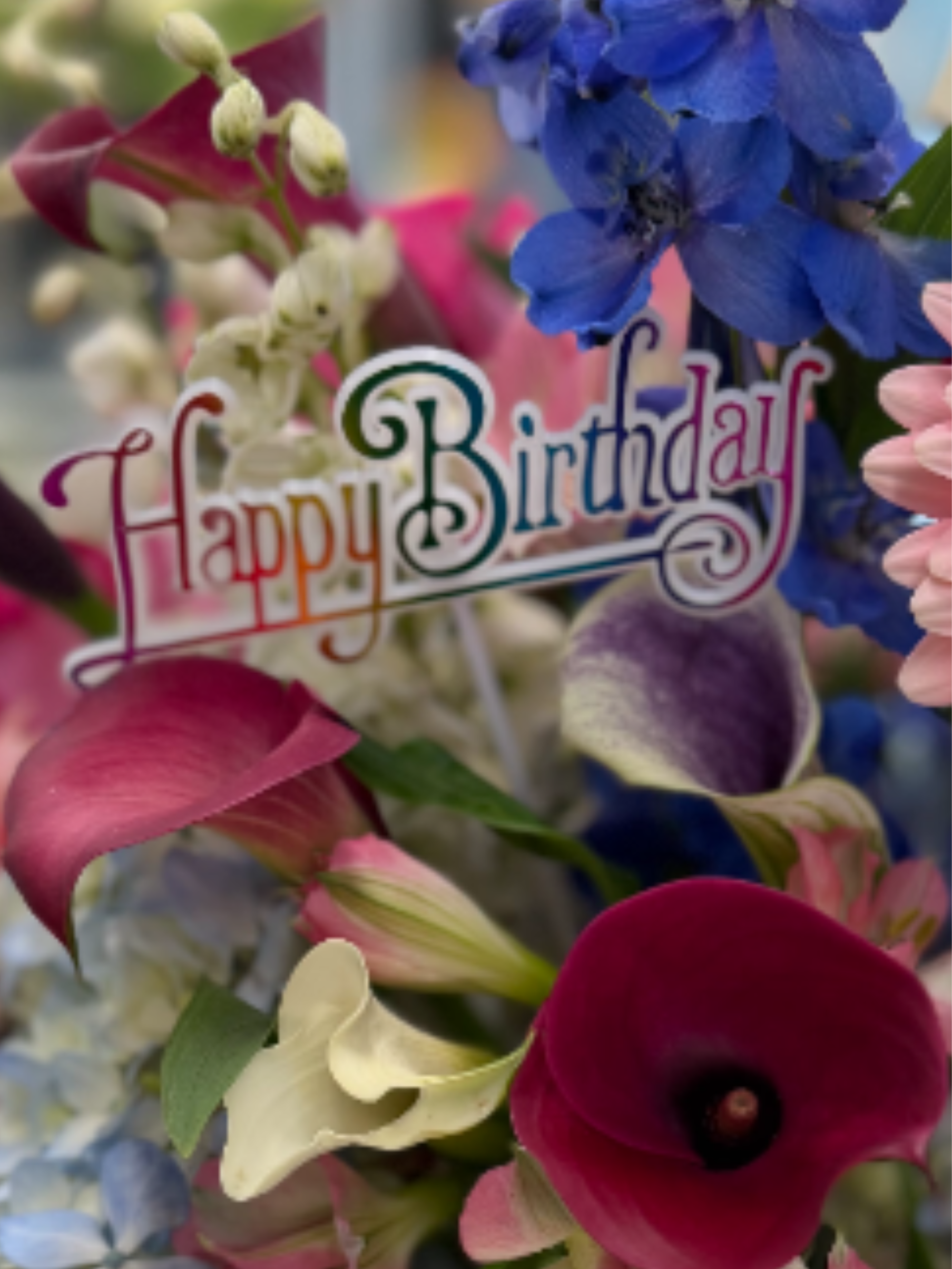 Birthday Designer's Choice - Allow our designers to choose the freshest and most colorful blooms to create the perfect addition to any birthday celebration.  