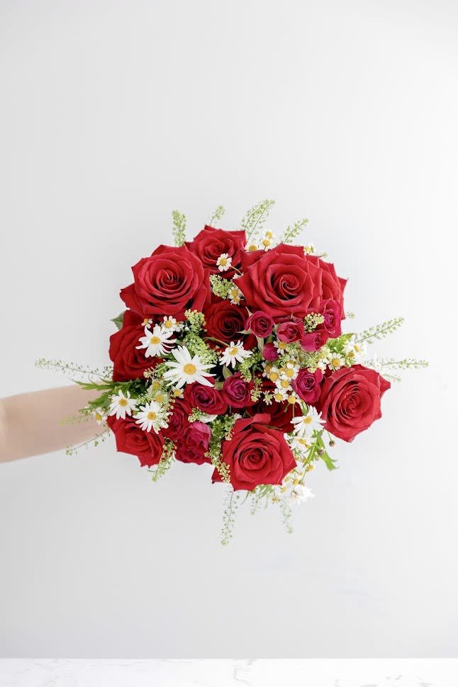 Darling - A flirty twist on the standard rose bouquet.  *Vase not included