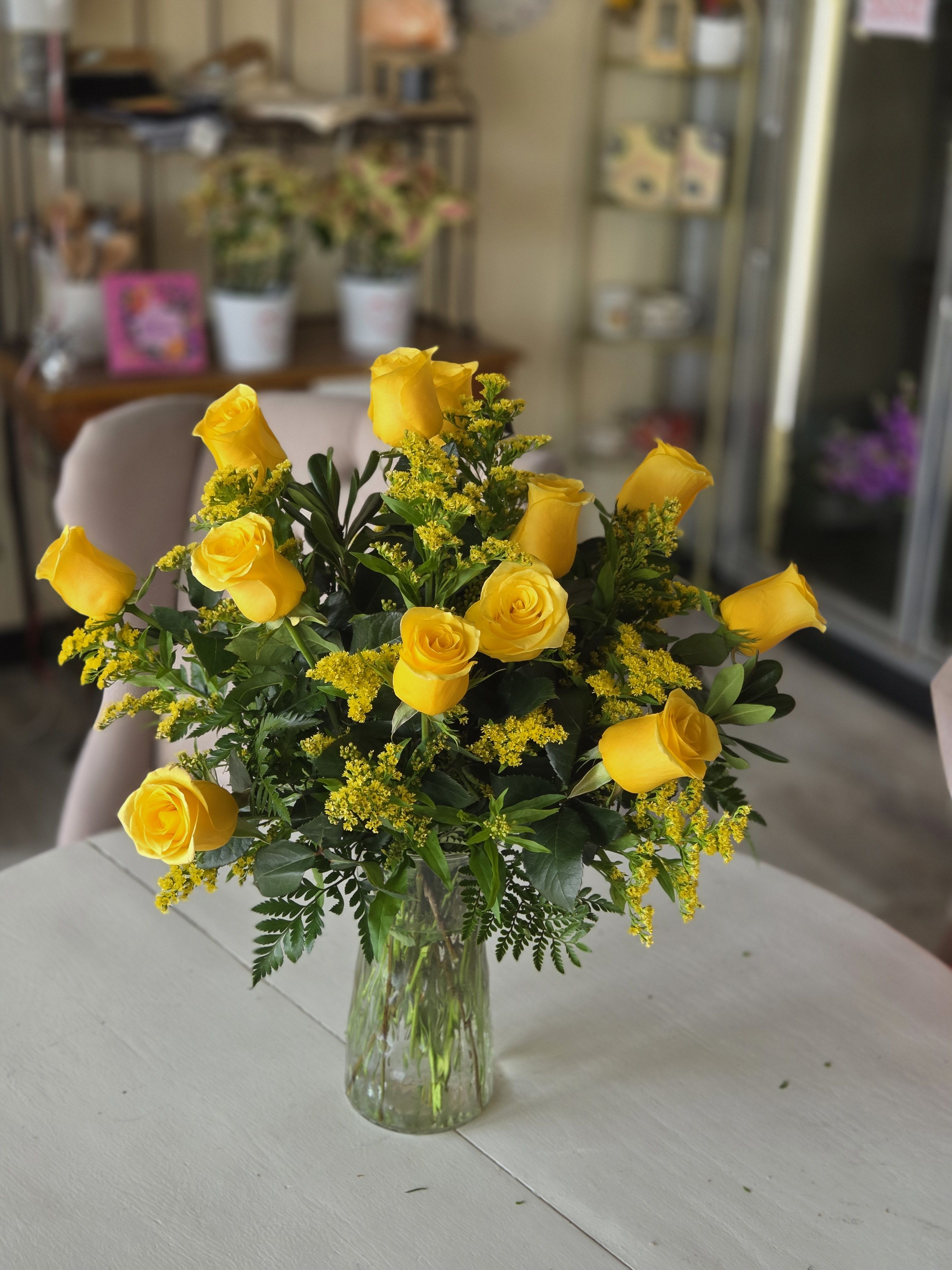 Felicitations by BloomNation™ - Yellow roses are a great option to send a non-romantic love. Send yellow roses to your friend or family member to brighten up their space and celebrate them! Yellow roses are a good gift for graduations, birthdays, or celebrating an accomplishment like a new job.  Approximate Dimensions: 18"D x 25"H