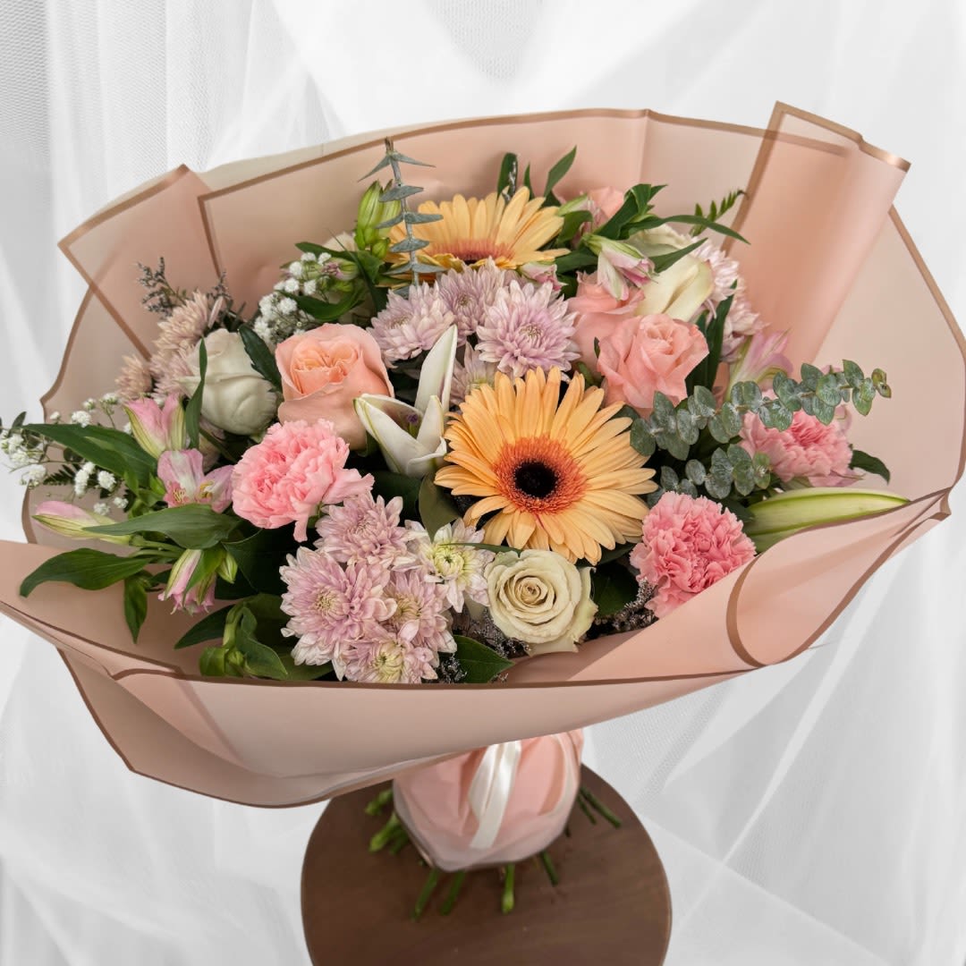 You're Beautiful. - Handheld wrapped bouquet.