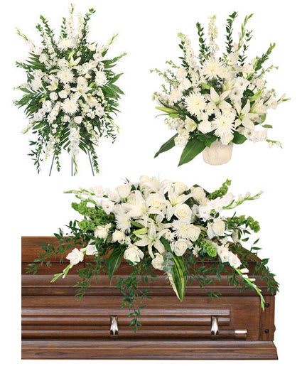 Loving Goodbye Sympathy Bundle - Honor your loved one with a simply stunning sympathy collection. A heartfelt addition to any service, this collection is full of calming tones and elegant shades. Featuring lovely mums, lilies, carnations, roses, and more, our Devoted Goodbye Sympathy Collection is a timeless classic that will lift the spirits of those around. 