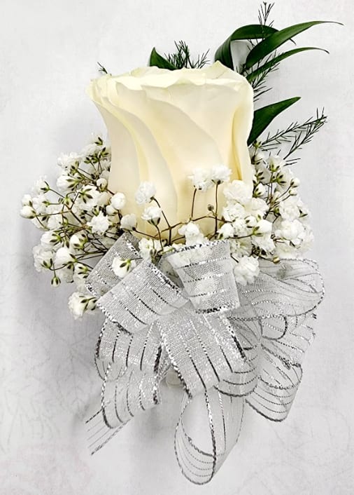 White rose boutonniere with baby's breath and silver ribbon