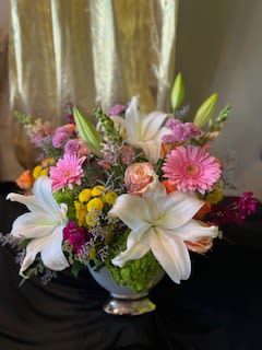 Spring Stroll - Take a stroll with us through our joyful, flamboyant display of blooms. Flowers subject to substitutions!