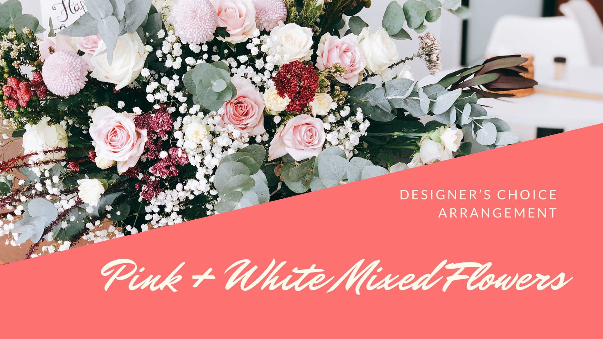 Pink and white mixed flower arrangement with roses and round blooms