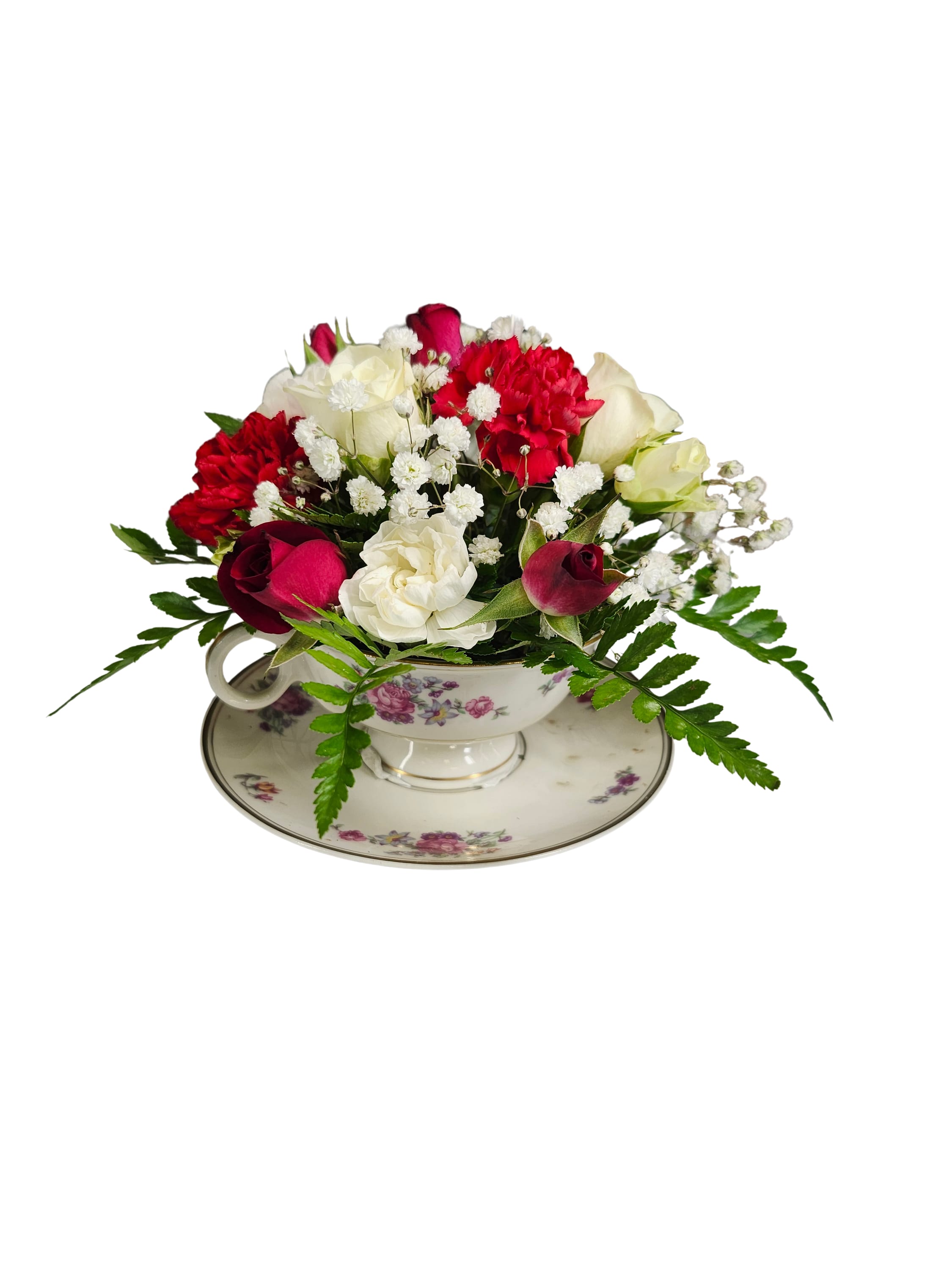 Vintage Teacup Garden - Sweet, charming, and full of timeless beauty, the Vintage Teacup Garden is a delightful floral arrangement designed in an elegant floral teacup and saucer set. Featuring romantic red and white blooms accented with delicate baby’s breath and fresh greenery, this petite arrangement blends classic elegance with cozy cottage charm. Perfect for birthdays, thank-yous, Mother’s Day, tea lovers, or simply brightening someone’s day, this keepsake piece is as lovely as it is unique.  If wanting a different color scheme, please put your requests in the comment section when checking out.
