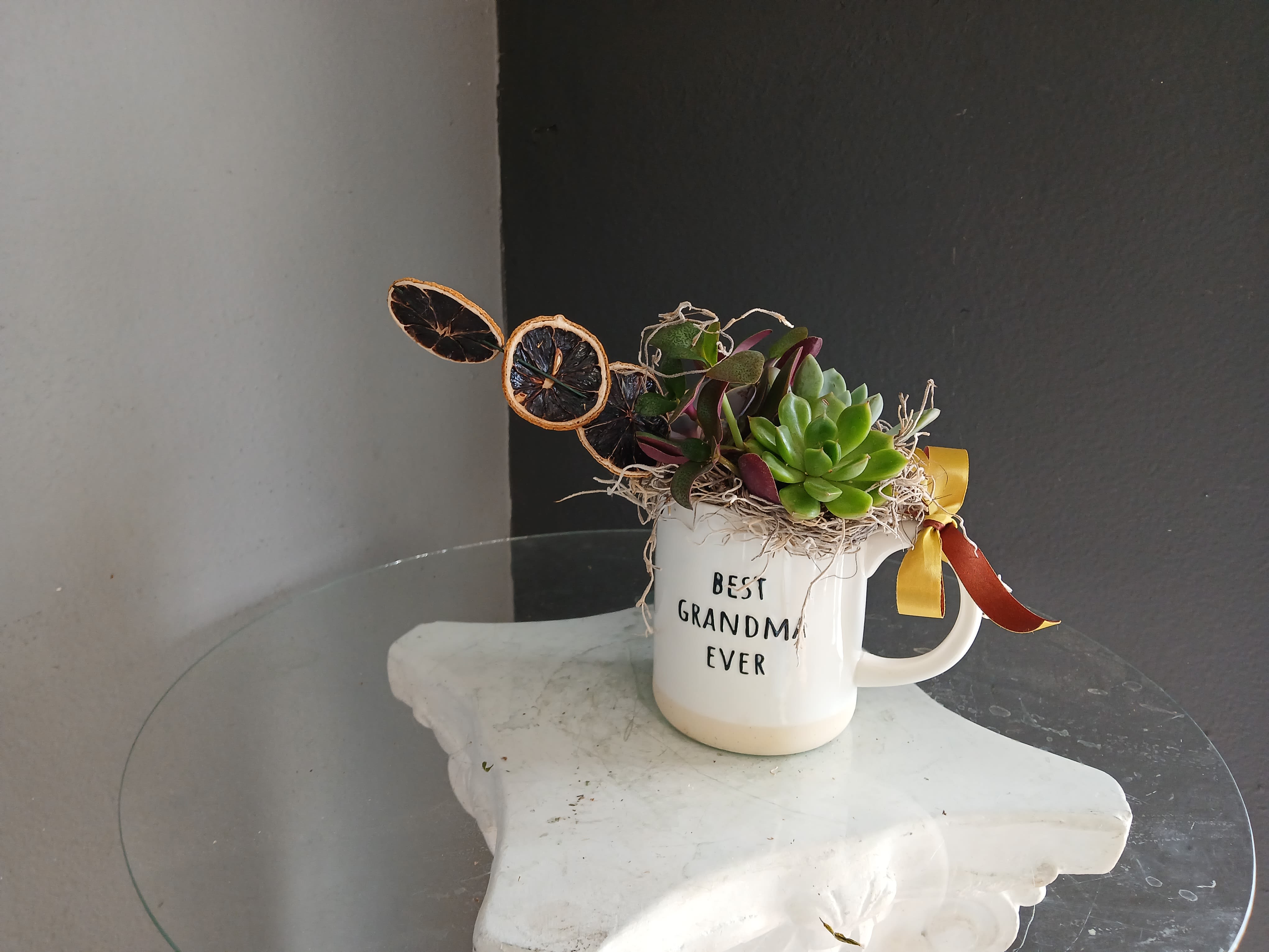 Best Grandma Ever Succulent with Oranges - Precious succulent arrangement in a mug with a dried orange accent