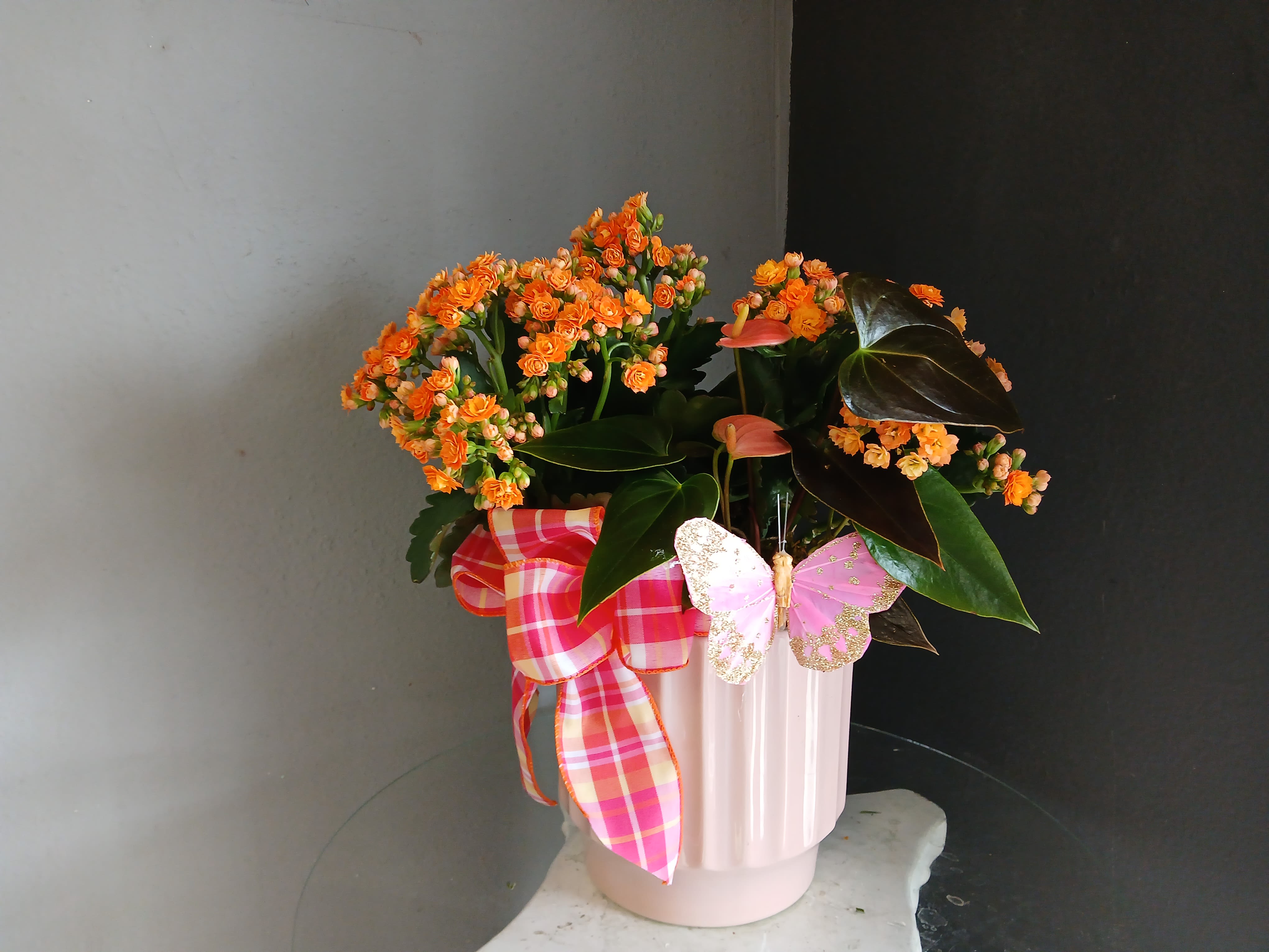 Mixed antherium arrangement #PL111 - Light red antherium with kalanchloe and a pink butterfly.