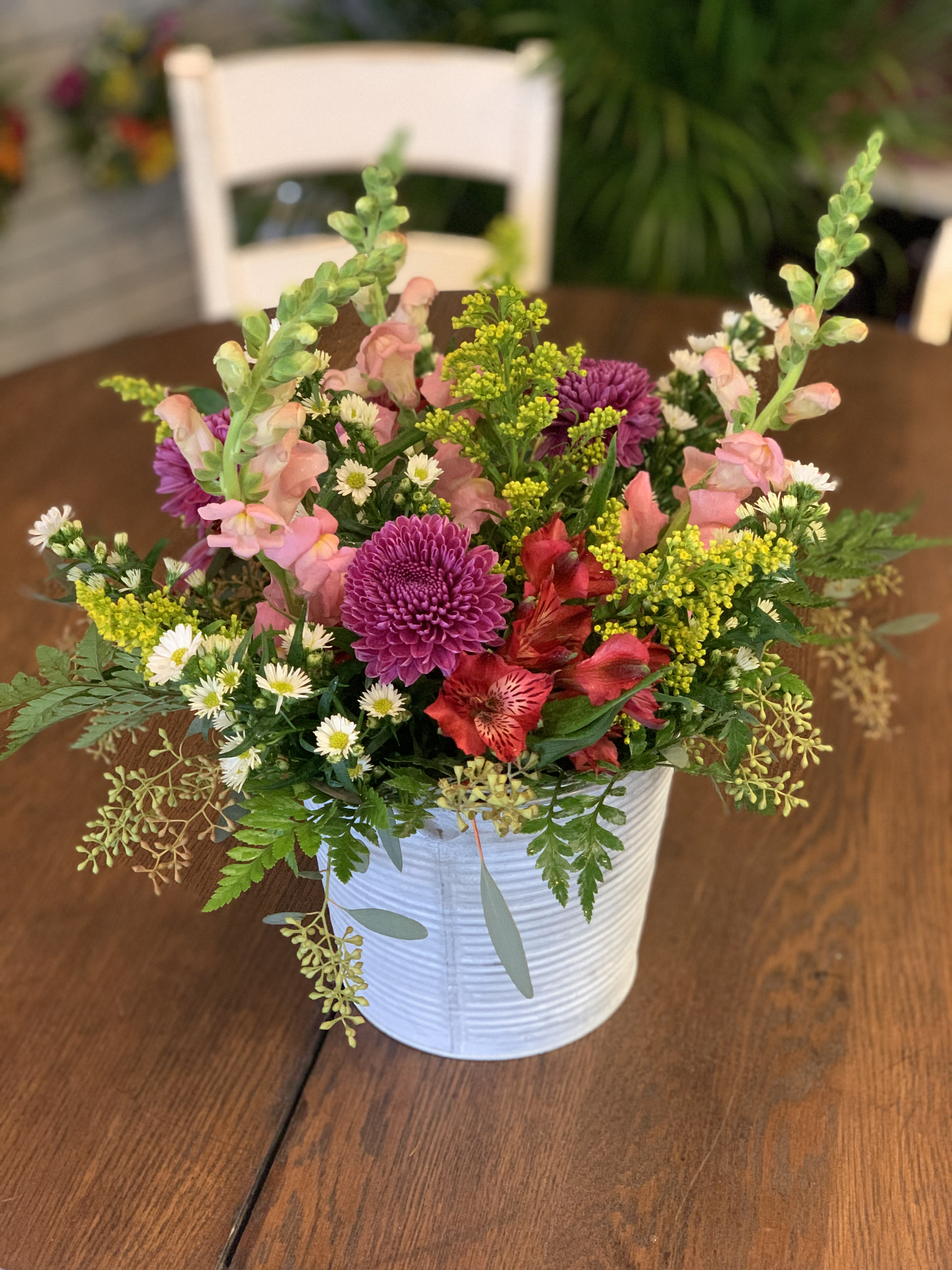 Classic Bucket of Blooms - A bucket full of a mixture of different flowers. *Please note that the flowers and colors may be different from what is pictured, but will have the same look and feel.*