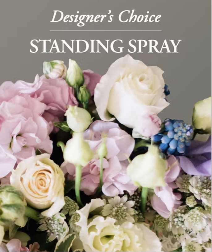 STANDING SPRAY Designer Choice - Our designers send your very best regards when you select a custom standing spray. We use the freshest available flowers to design a fitting tribute to a loved one who will always be remembered.
