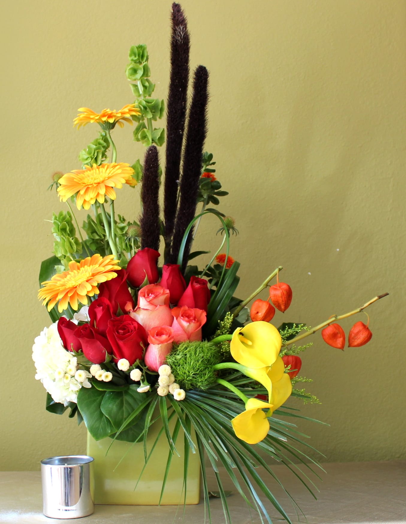 Just Delightful - Gerbera daisies ,mix of red and orange roses, and mini calla lilies.
