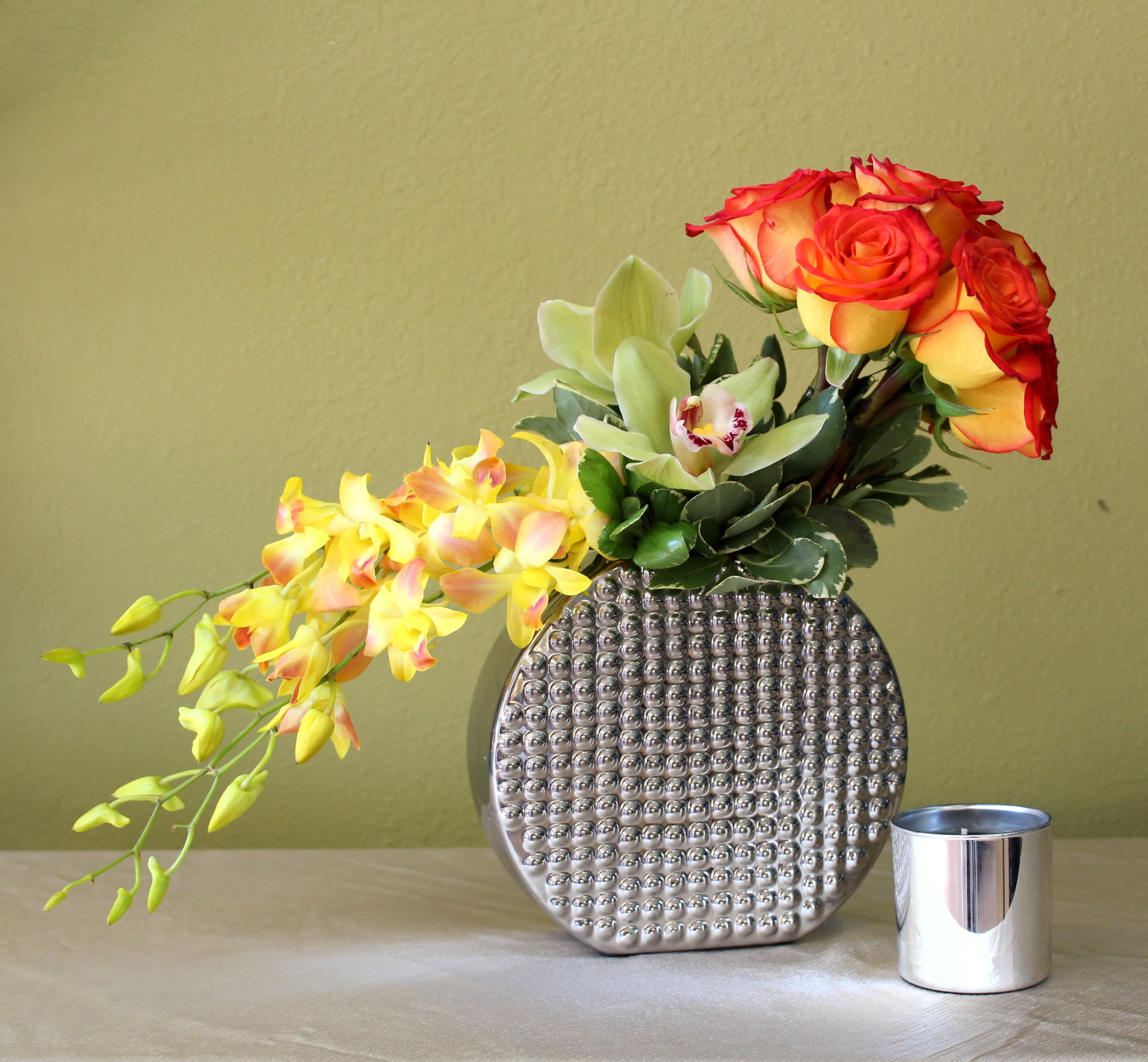 simple love - yellow roses with orange tips  green cymbidium orchids and yellow dendro orchids 