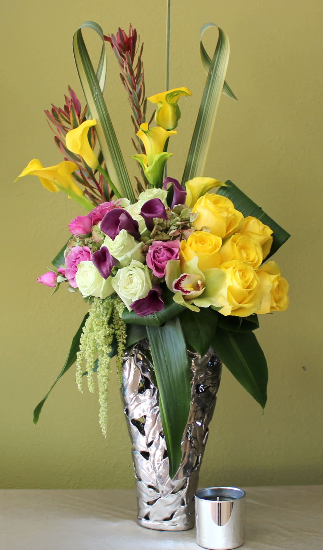 elegant dream  - yellow and purple mini calla lily's, yellow and green roses, pink mini roses, elegant silver vase   