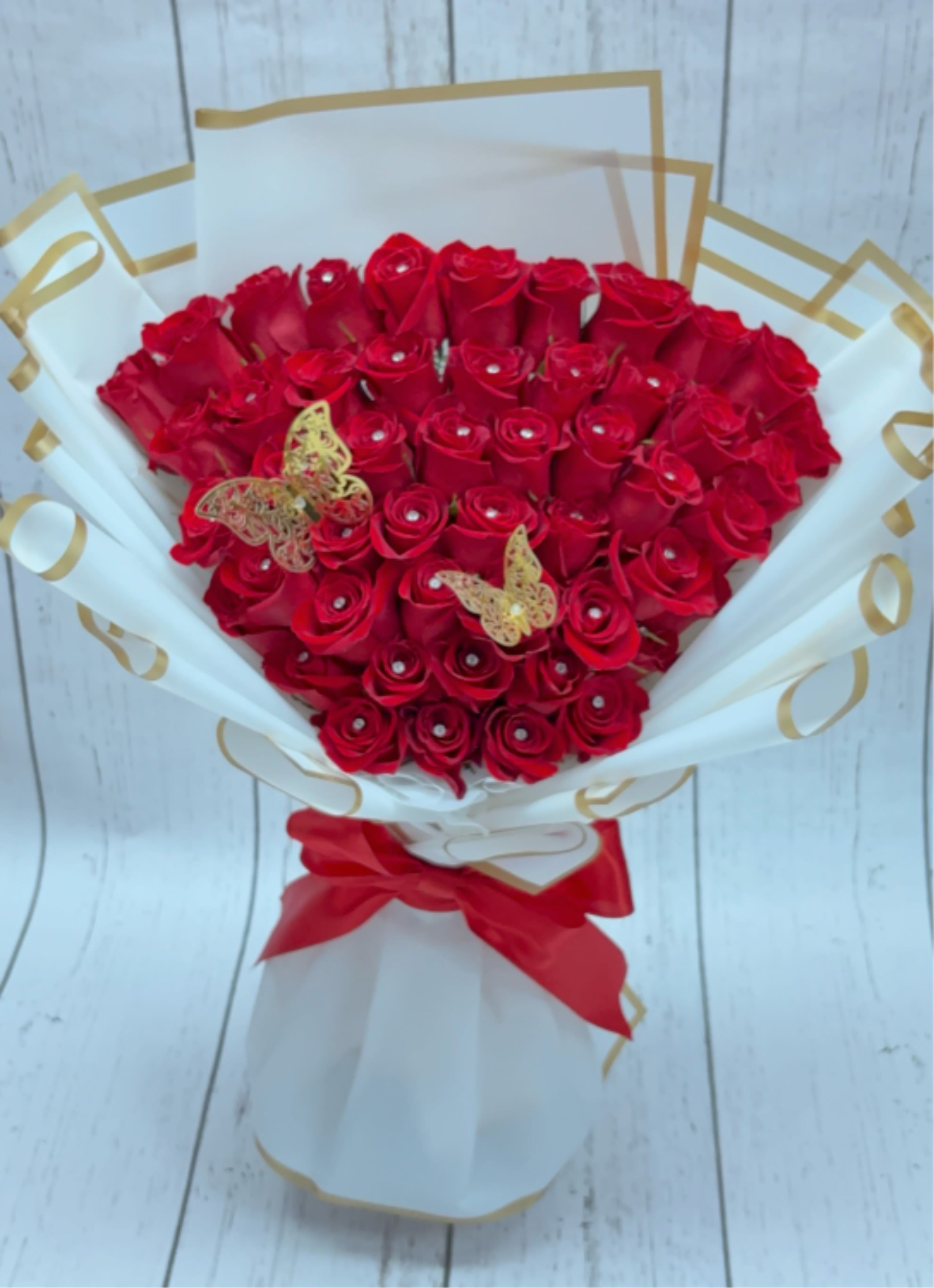 Beautiful  red roses - 48 long red roses, pins, and in beautiful white paper