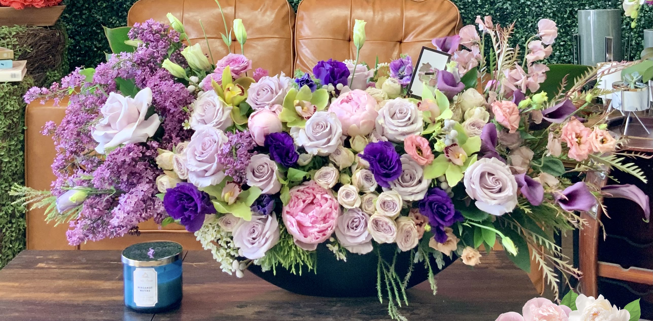 Lilac Dream - Lilacs, peonies, orchids oh my! Stunning unique floral arrangement sure to wow for any occasion. 