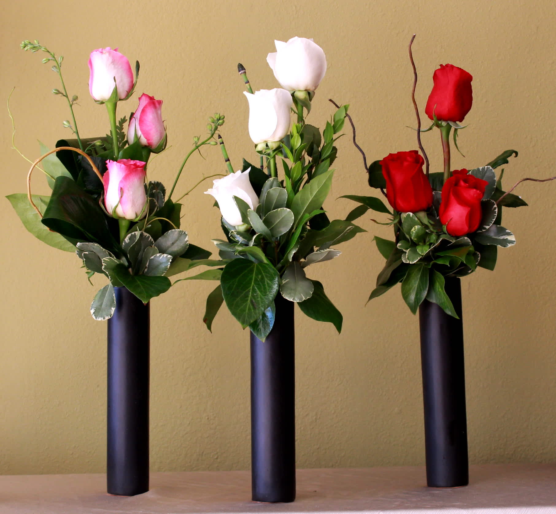 pick ur favorite color - 3 long stem roses in a ceramic black cylinder  bud vase with elegant greens and curly willow  