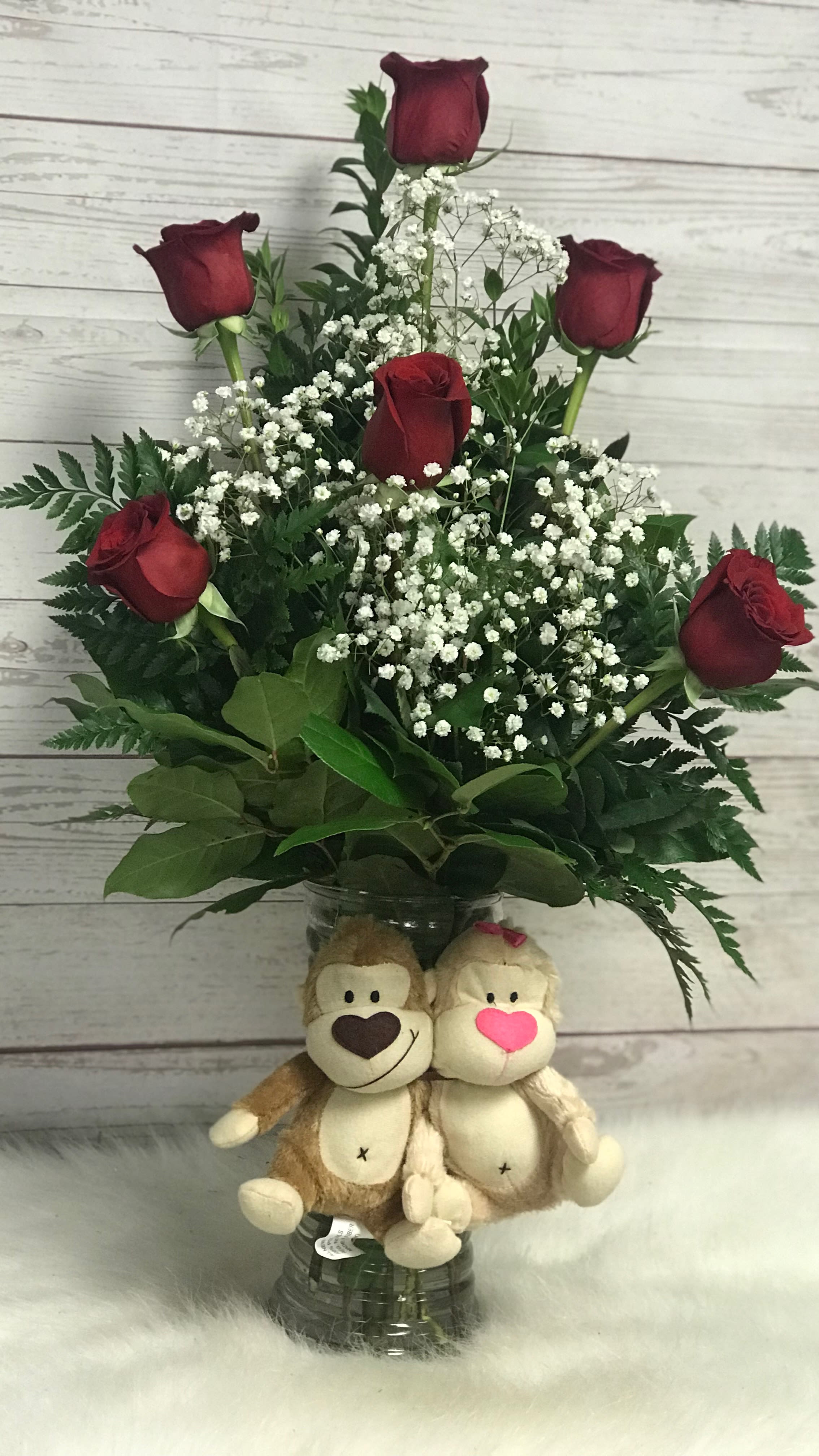 For My Sweetheart - Half dozen red roses, arranged in a glass vase that includes a plush animal. 