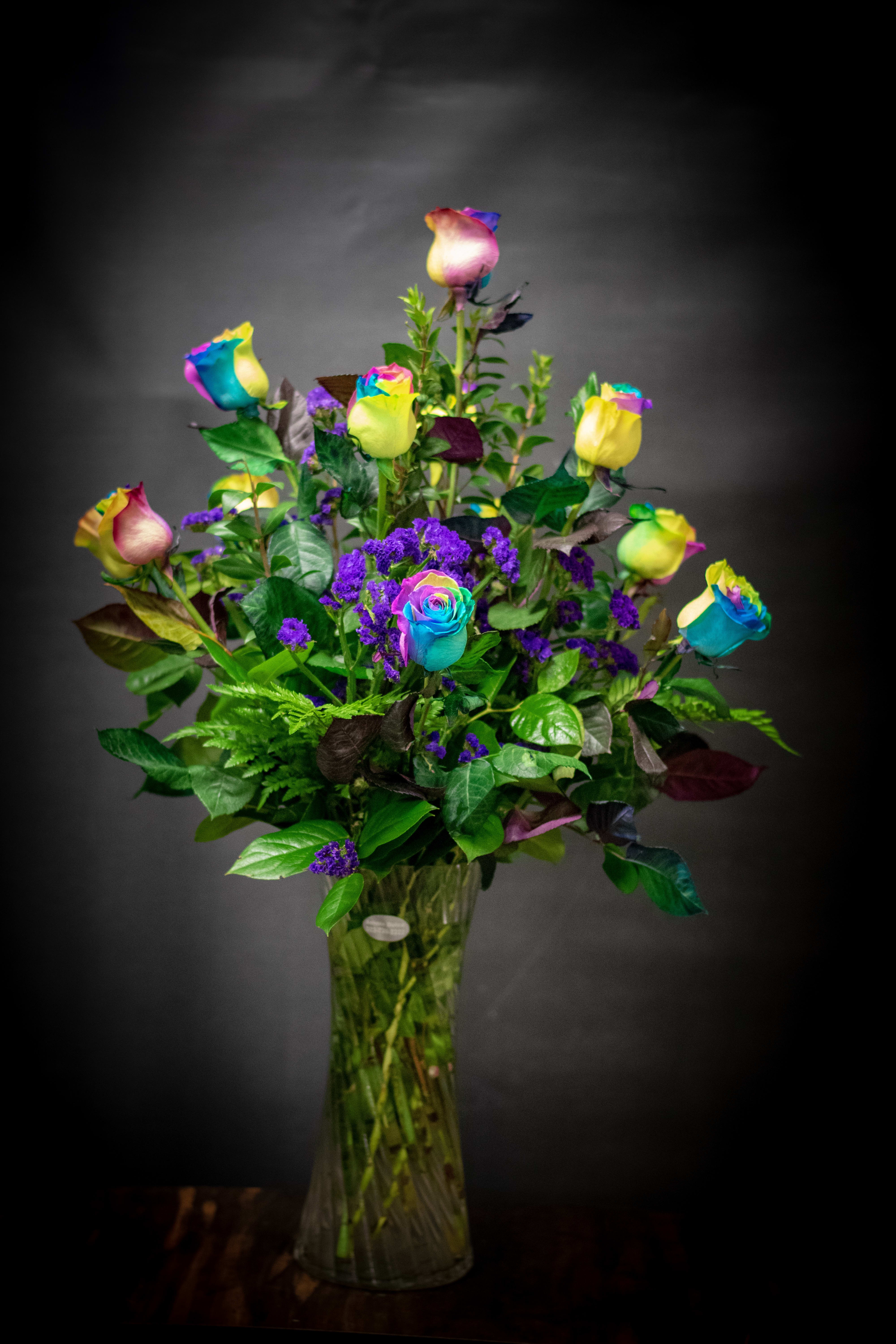 rainbow roses  - A dozen  rainbow rose assorted in a high end vase 