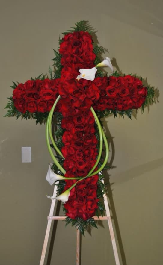 Covered In Roses Cross - Stunning red roses and Cala lilies.