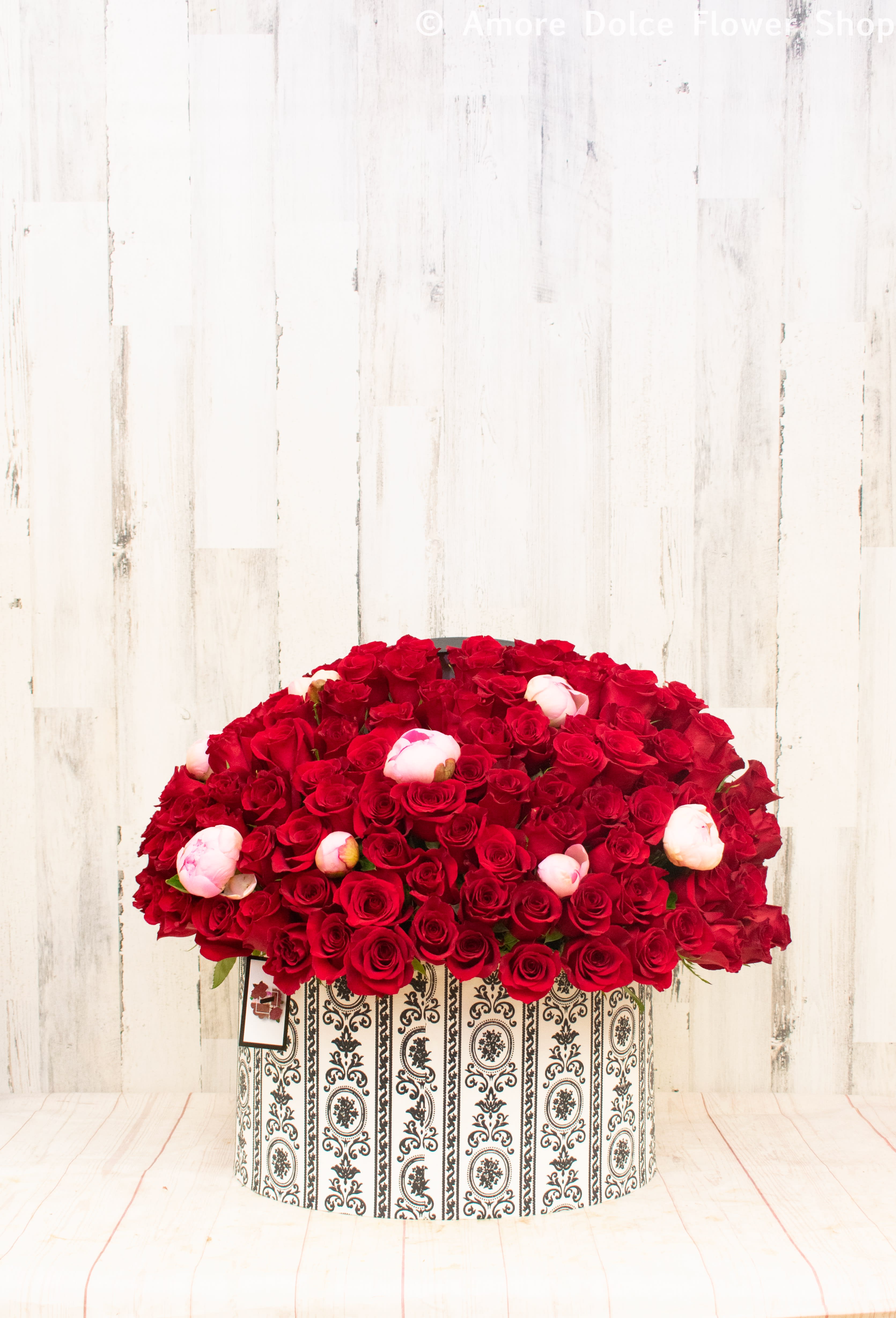 Box of love  -  This arrangement has 120 Ecuadorian roses with peonies Premium and the  Deluxe's will get more Peonies in the arrangement                                             Flower delivery montebello ,Whittier,Pasadena,Downey,Pico Rivera,la habra,downtown ,los angles 
