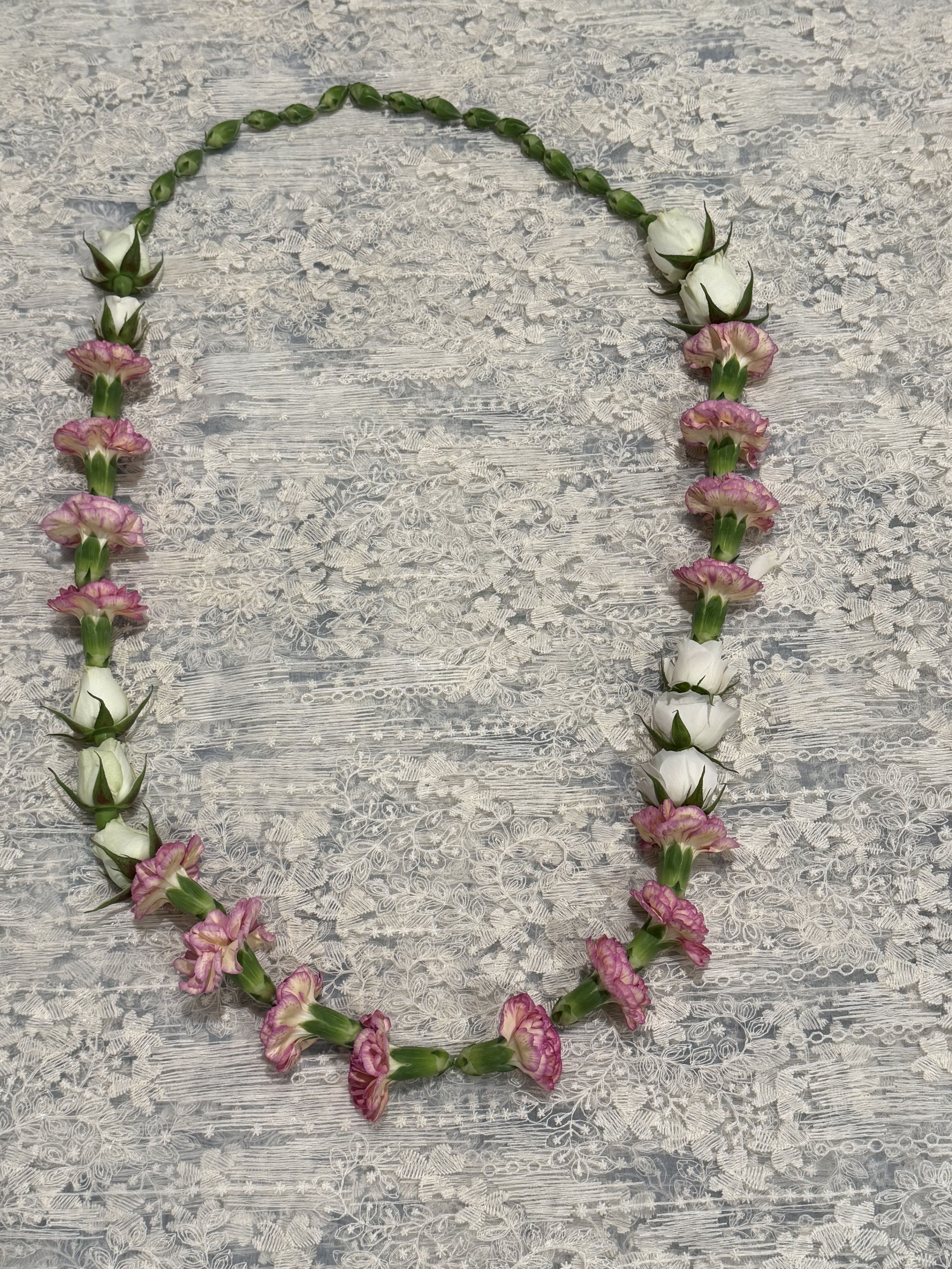 Carnation Lei - Mini carnations and spray roses   Note: color can be customized, add a note under special instructions 