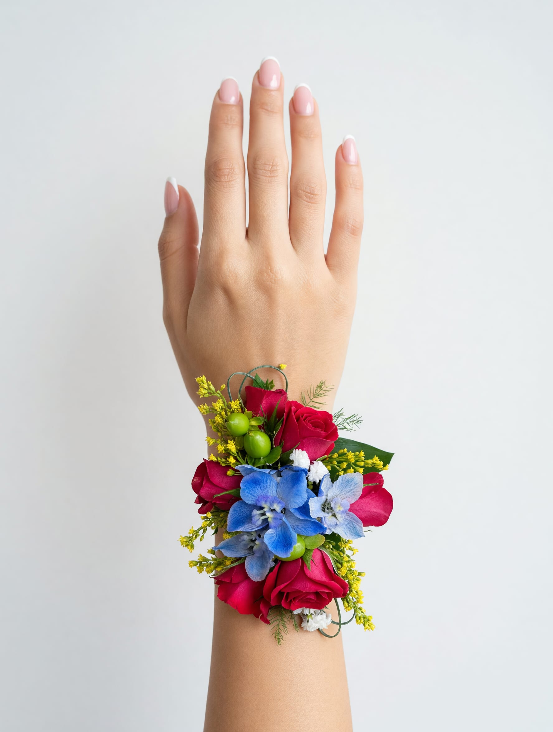 Corsage - Color choice option - Our Colorful Pop Corsage features a vibrant mix of colors that instantly catch the eye, adding the perfect fun pop to your prom look! Color requests are welcome but not guaranteed.  We have 2 wristlet color options, white and black. If you have a preference leave us a note in the recipient information box at checkout!  Select the deluxe option to order a bout. &amp; corsage set!