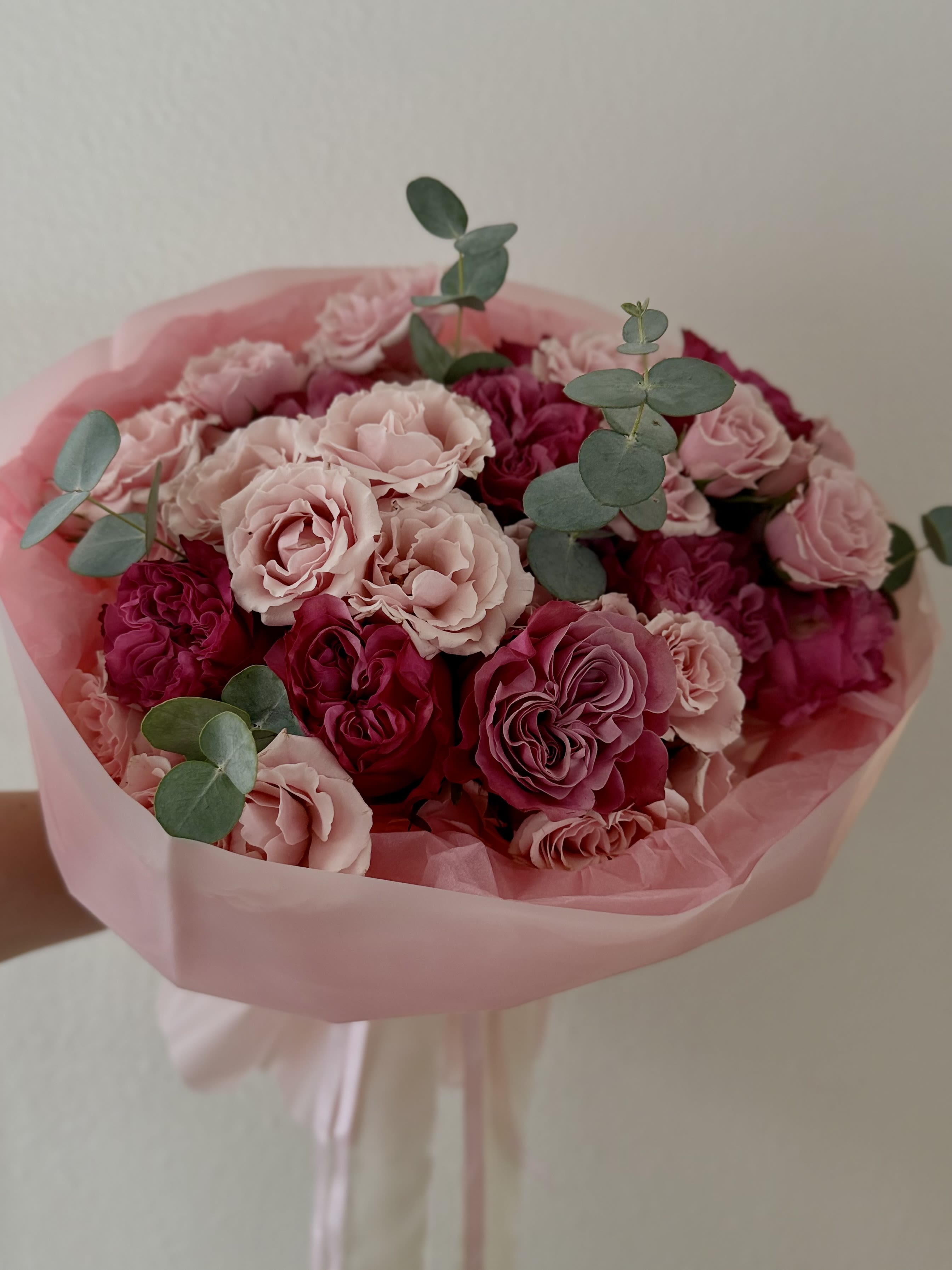 Marshmallow - “Marshmallow” — a soft, airy bouquet of blush and berry spray roses accented with fresh eucalyptus. Delicate tones, ruffled petals, and a light, sweet feel — like a fluffy treat made to bring joy and melt hearts.