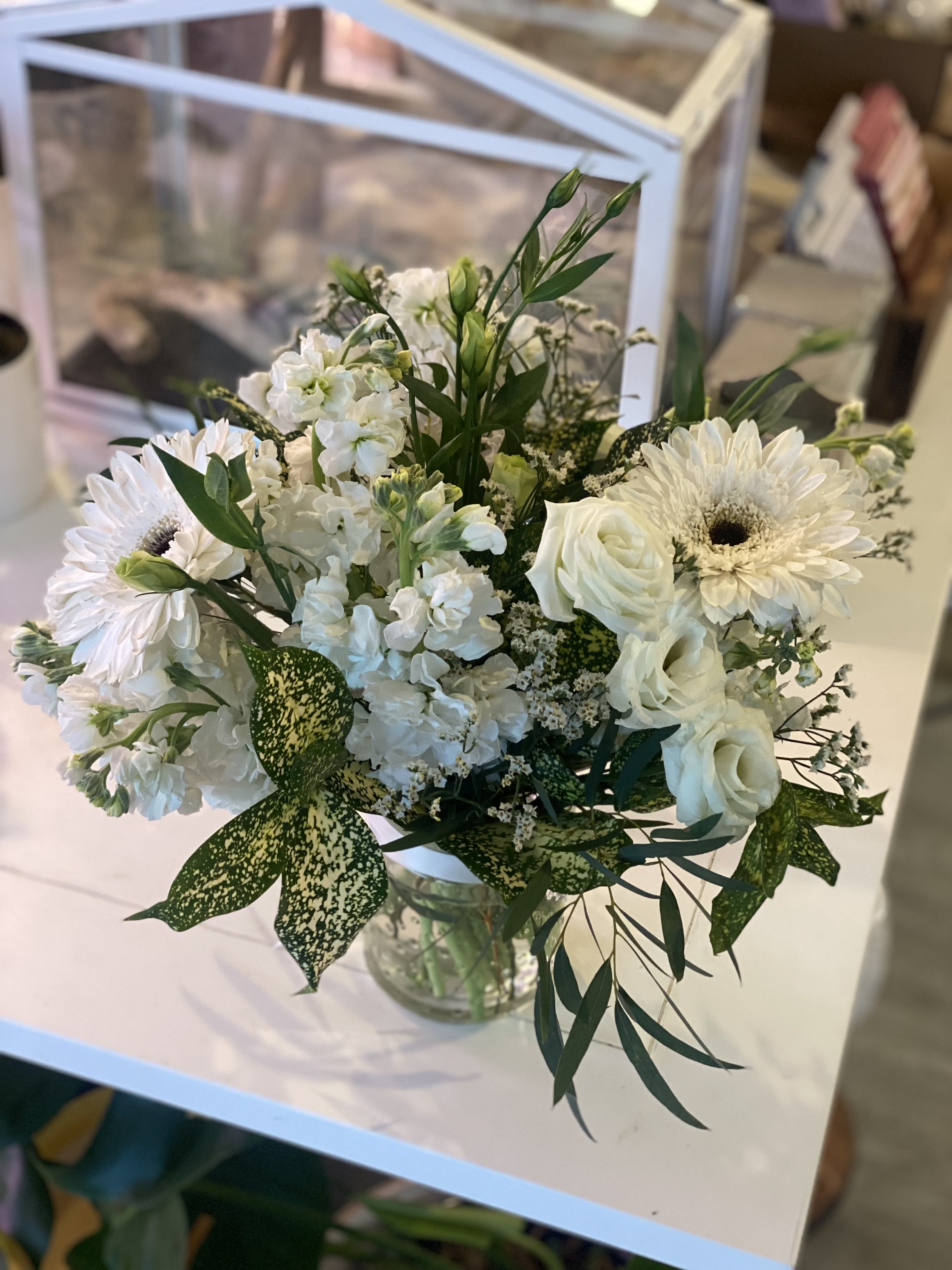 Neutral Blooms - Soft white flowers with greenery.