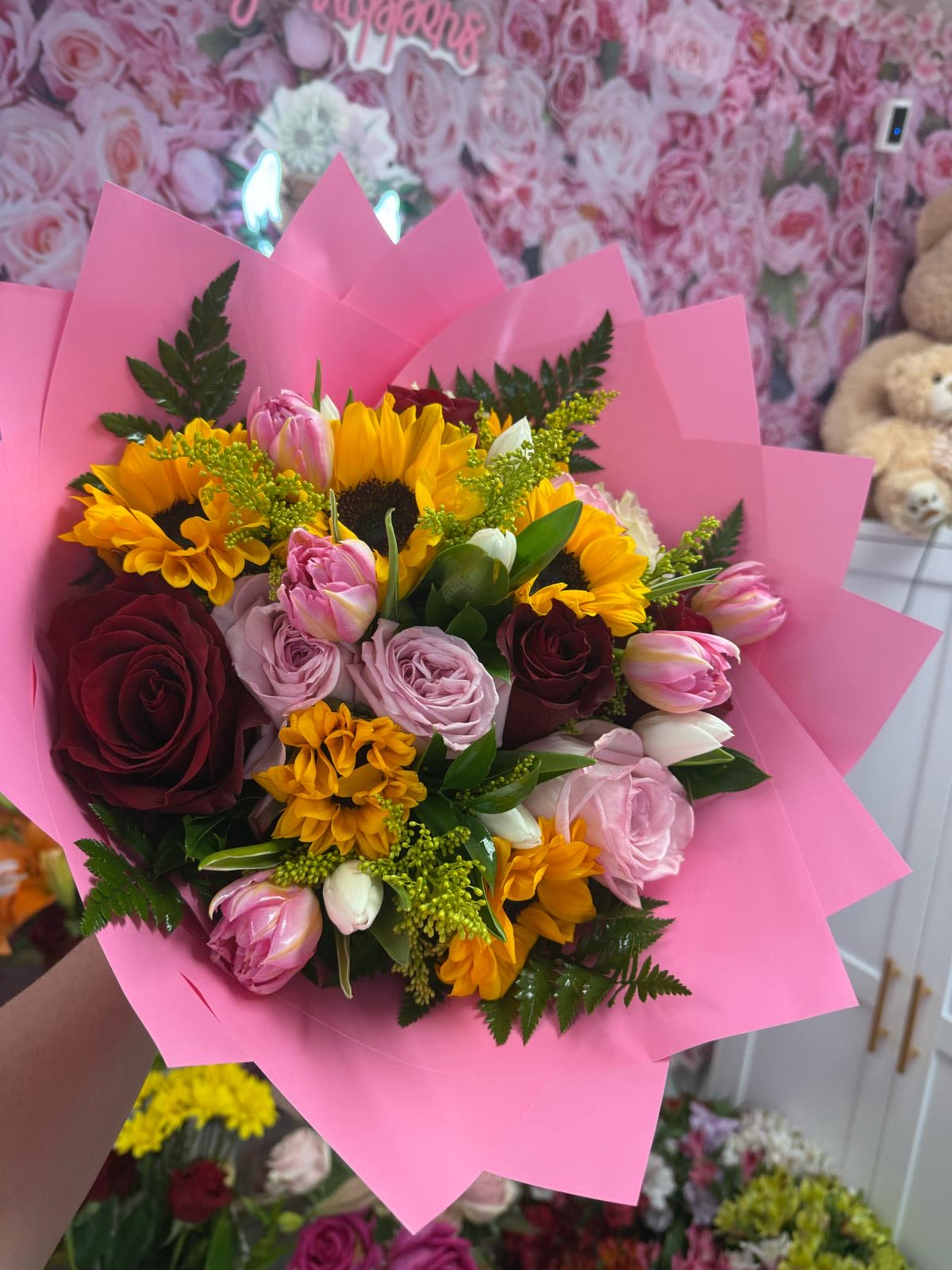 Wrapped in love  - A beautiful wrap with roses, sunflowers and Tullips 