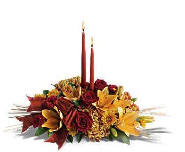 Graceful Glow Centerpiece -  Pet Friendly? No This arrangement contains Eucalyptus and Alstroemeria, which can cause gastrointestinal upset in household pets. Additionally, while Peruvian lilies are less toxic than true lilies, they are still best kept away from cats. Keep out of reach; avoid homes with curious cats.   Human Allergy Note : No major allergy-triggering flowers noted.   Care &amp; Longevity : Since this is a centerpiece usually arranged in floral foam or a shallow bowl, it requires consistent hydration. Check the water level daily by gently feeling the foam or peering into the container; add fresh water to keep it saturated. Trim any fading blooms immediately to keep the rest of the arrangement healthy.    Best Occasions &amp; Situations : - Milestone birthday dinner - Anniversary table for two - Housewarming gift - Thinking of you / Comfort - Celebration of life reception - Holiday hosting - Corporate banquet decor   Why Customers Love It : - Perfect height for dining tables—no need to move it to talk to guests. - Sophisticated palette that fits almost any home interior or “modern farmhouse” vibe. - Lush density makes even the standard size look high-end and generous. - Long-lasting mix of hardy blooms like carnations and spray roses.