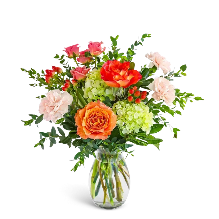 Fresh Apricot - Fresh Apricot features peach roses, carnations, hydrangea, and hypericum berries accented with premium foliage in a clear glass vase. Designed for effortless elegance, this arrangement is a beautiful choice for everyday flower delivery from your trusted local florist. Flower varieties and shades may vary slightly based on availability while maintaining the overall color palette and style.