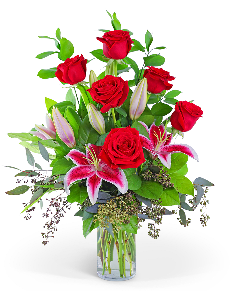 Stars in my Eyes - Stars in My Eyes is a beautiful design, perfect for showing your affection to that special someone. It features red roses, stargazer lilies, and premium foliage, all designed in a clear glass vase that will show well on a dining room table, desk, or end table. It is the perfect gift for Valentine's Day, a special Anniversary present, or to just send a reminder of your love.