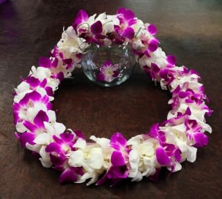 Double Graduation Orchid Lei / Purple &amp; White - Double purple and white dendrobium orchid lei.  NOTE: Please be aware the it takes 2 days for the order process. Same day pick up or delivery is not available. Feel free to contact us to inquire for any sooner availability. 