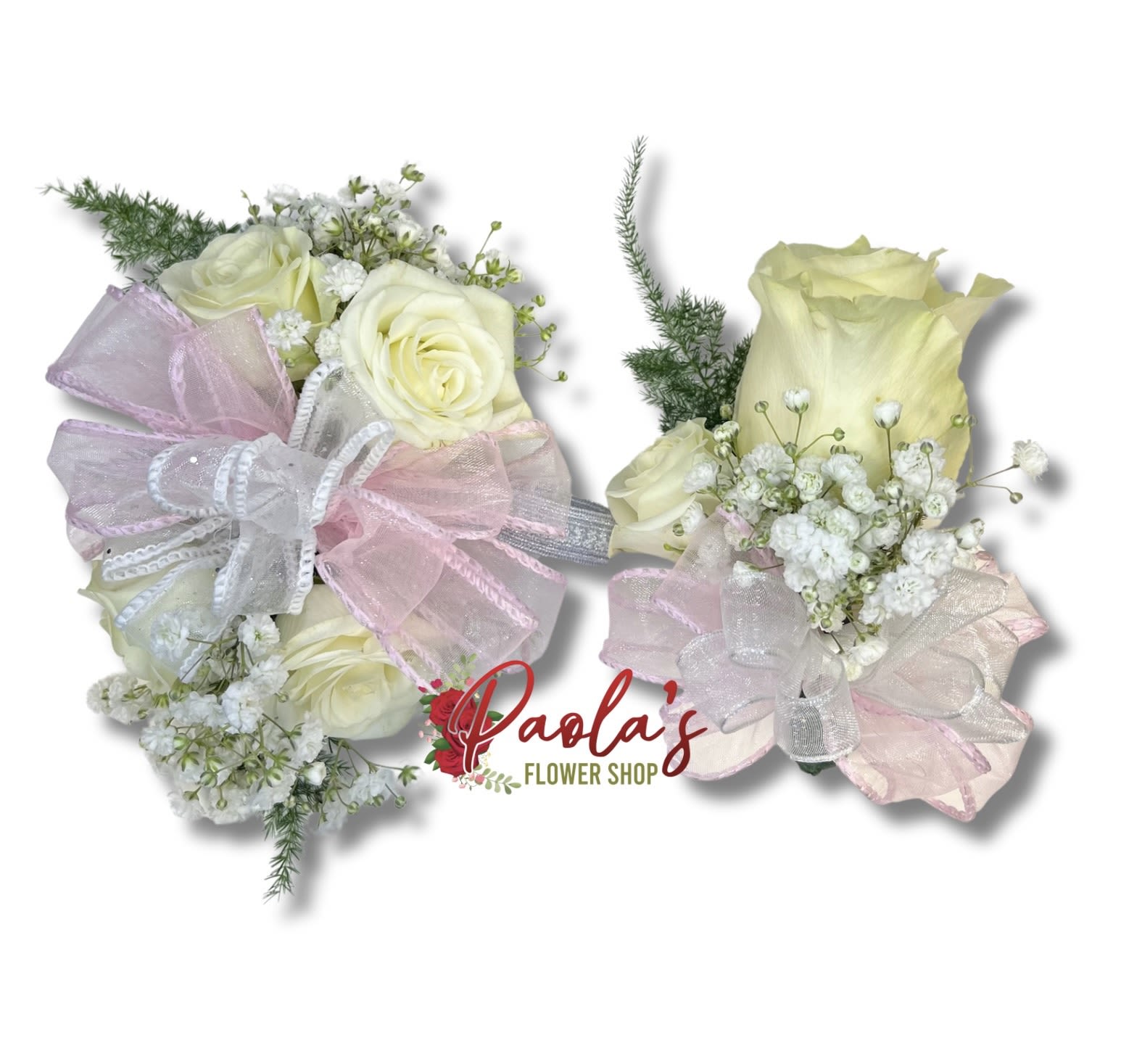Two small bouquets of cream roses with pink ribbon bows