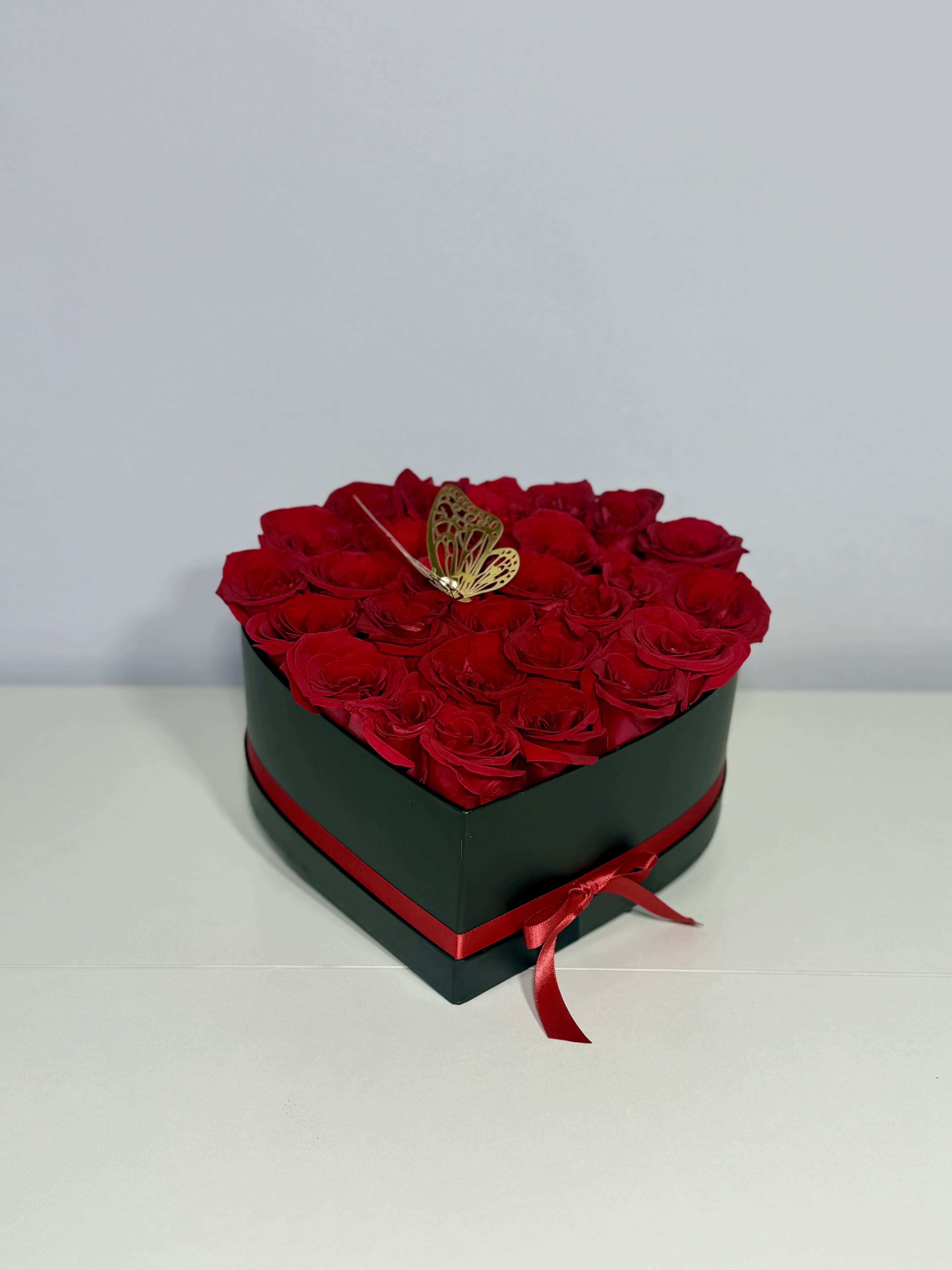 Heart Box  - Some feelings deserve more than words. Thoughtfully arranged red roses in an elegant black heart box, created to turn a beautiful gesture into a memory they’ll never forget.