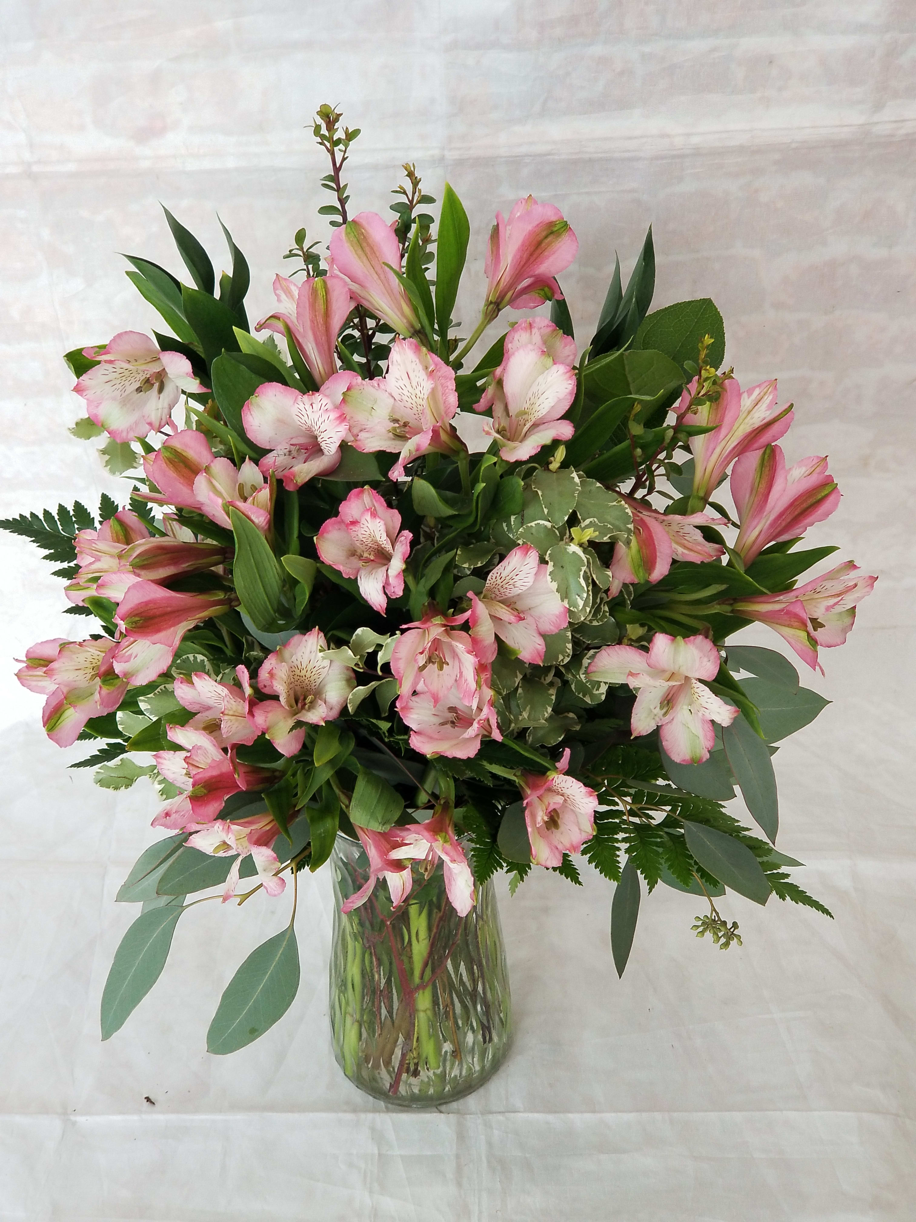 Simply Alstro - Select this clear glass vase of beautiful alstromeria. Colors may vary. Call for specific availability or add color request to special instructions and we will do our best to fulfill. 