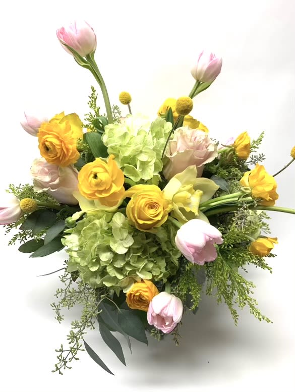 Bouquet of yellow and pink flowers with green hydrangea on a white background