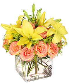 Lovely Day! - These radiant flowers are the perfect way to let that special someone know just how special they are! Have a Lovely Day is a stunning mix of bright yellow lilies and gorgeous bi-colored yellow and pink roses that rival even the sunniest day. Whether it’s for a special birthday or a “thinking of you” pick-me-up, this striking arrangement is sure to make any day lovely!