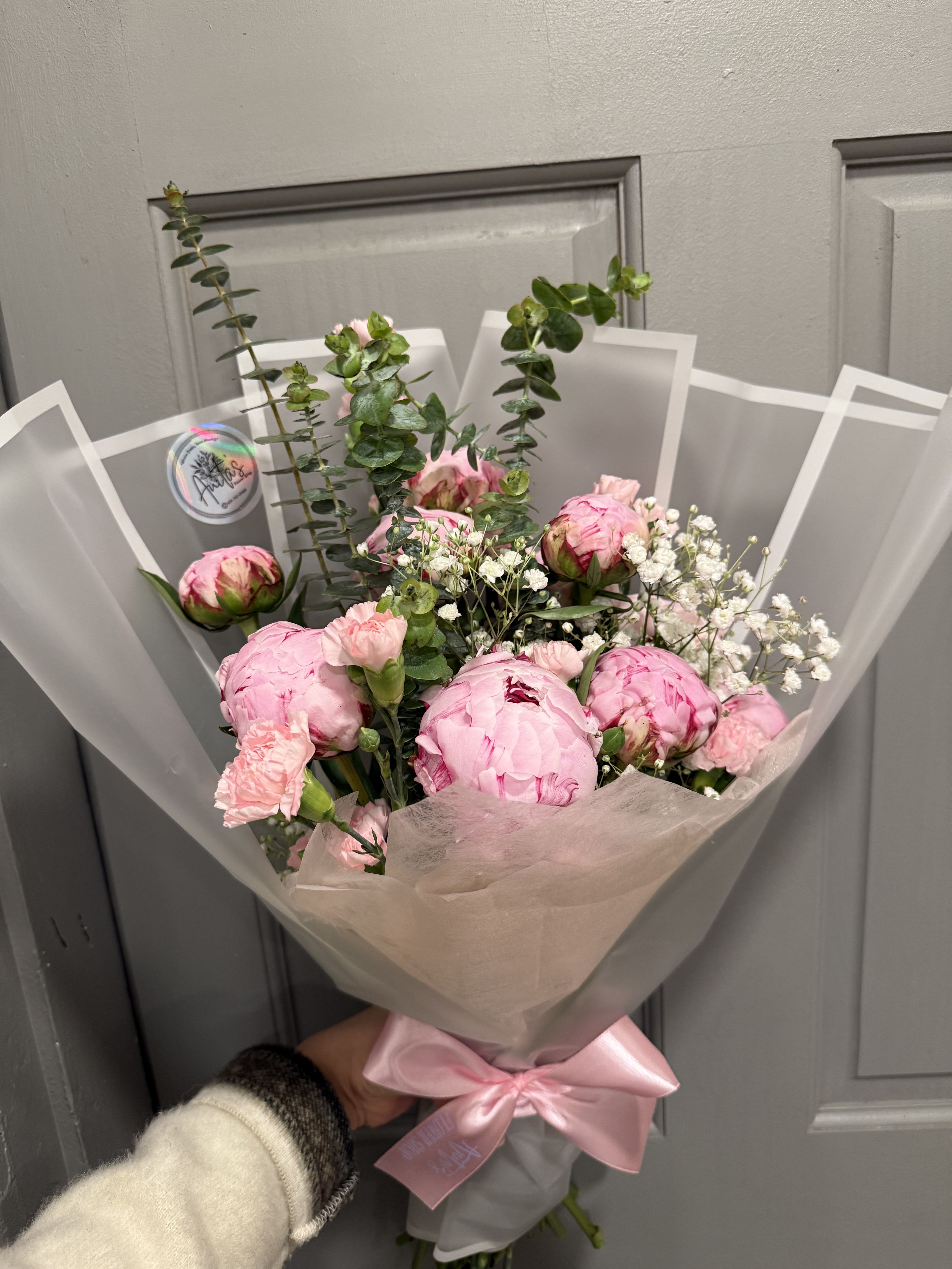 Pink peony bouquet with baby's breath and ribbon wrap